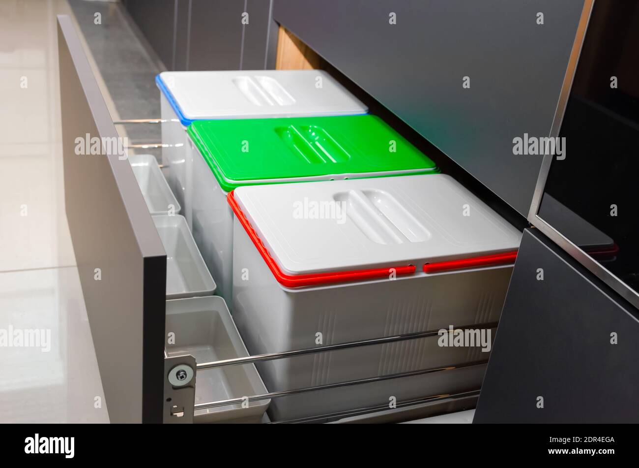 Three garbage containers for sorting garbage in the kitchen