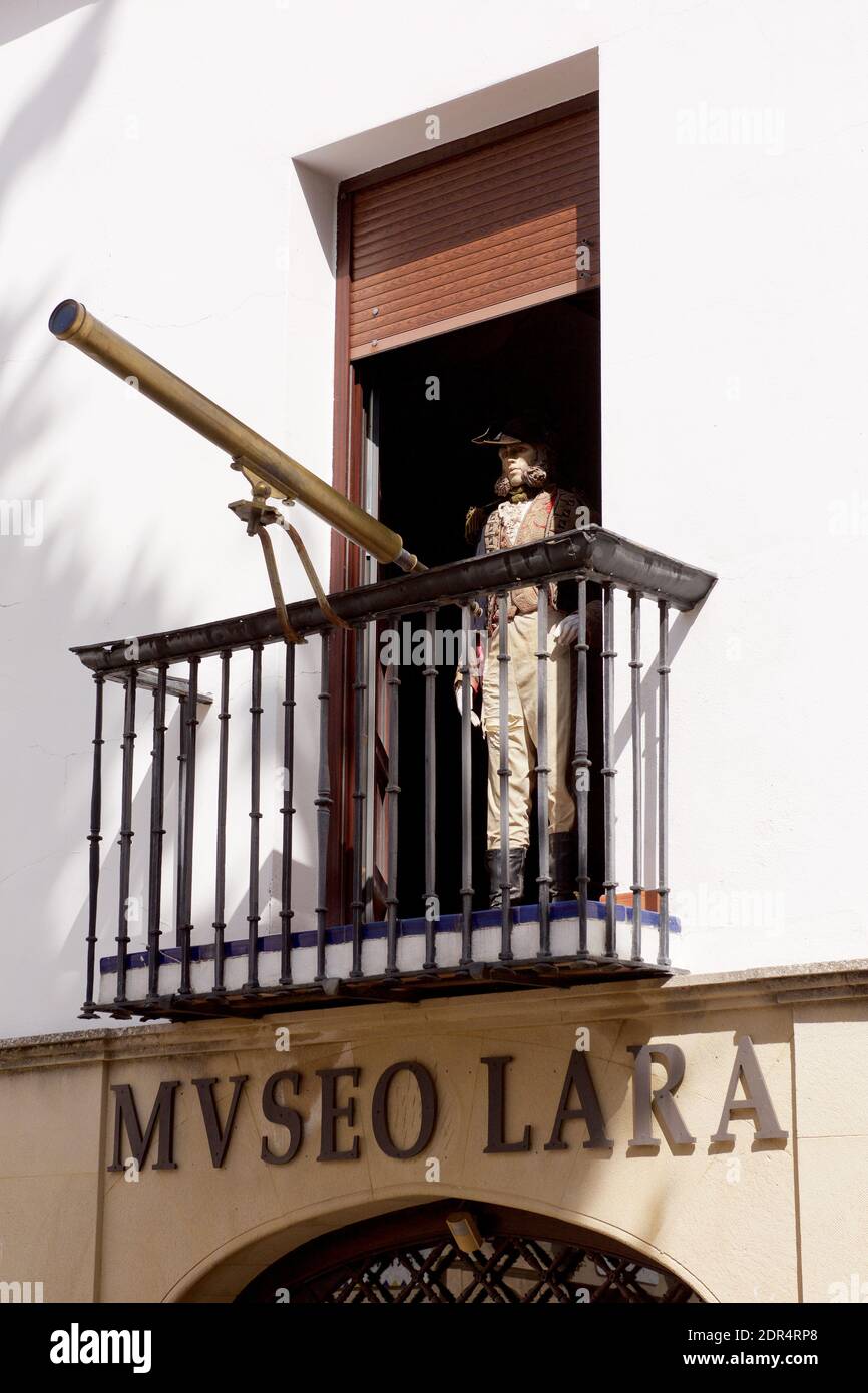 Mannequin with a telescope at the Lara Museum in Ronda, Spain Stock Photo