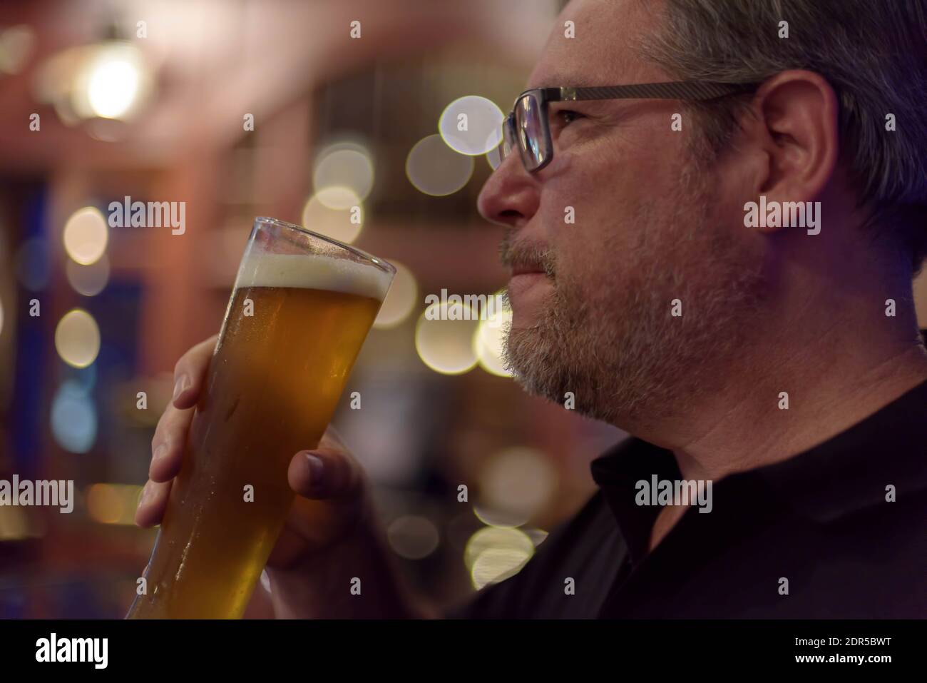 Man Drinking Beer From Glass Stock Photo Alamy