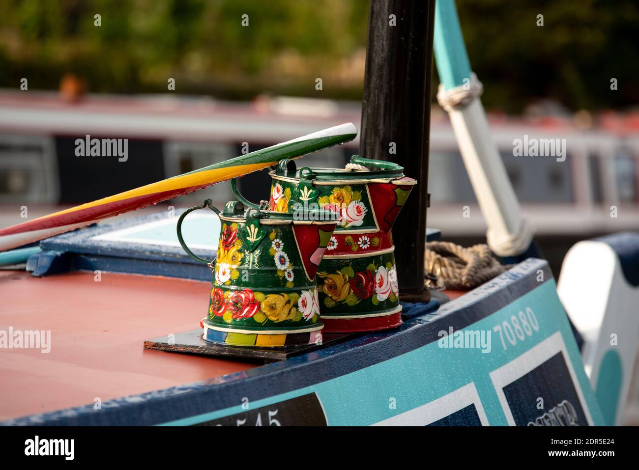 brightly coloured pots on barge decorated painted decorations Stock Photo