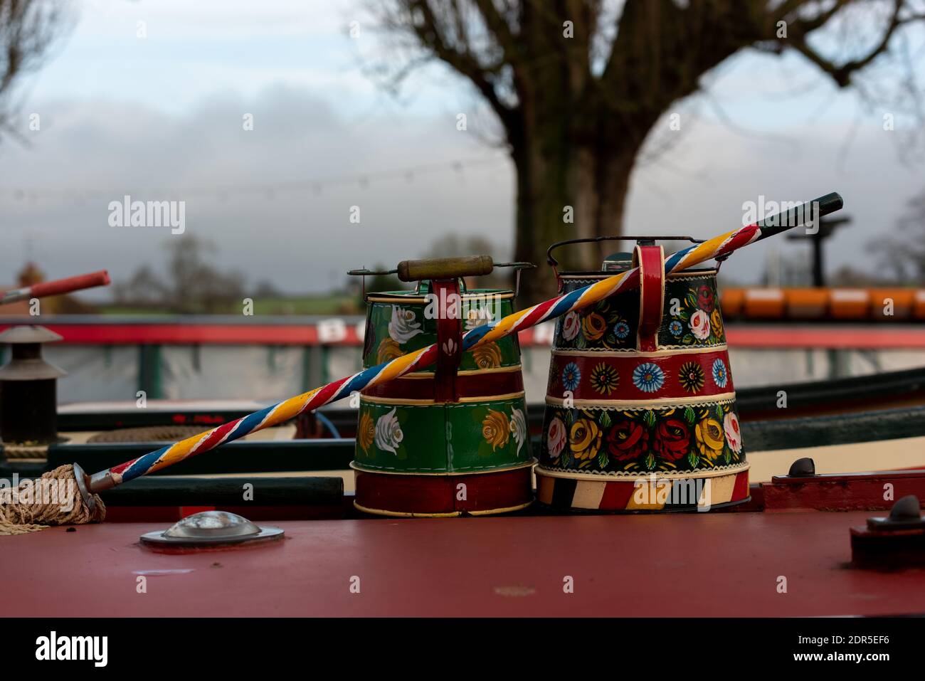 brightly coloured pots on barge decorated painted decorations Stock Photo