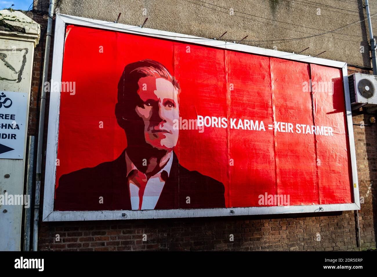 Boris Karma = Keir Starmer - Political billboard with Keir Starmer vs Boris Johnson Stock Photo