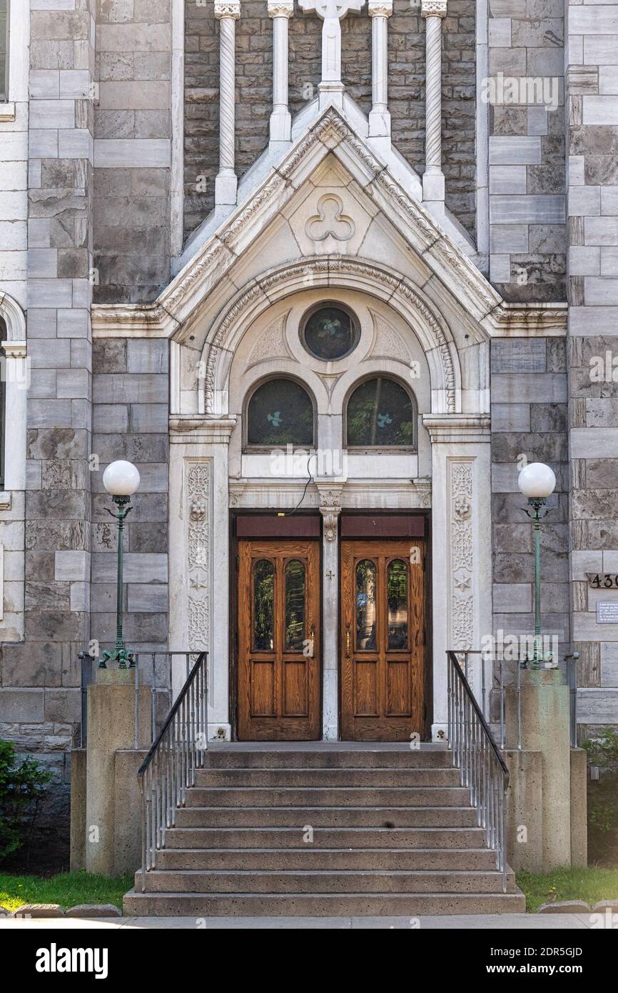 Notre-Dame de Lourdes. Architectural details of an old door, Montreal, Canada Stock Photo