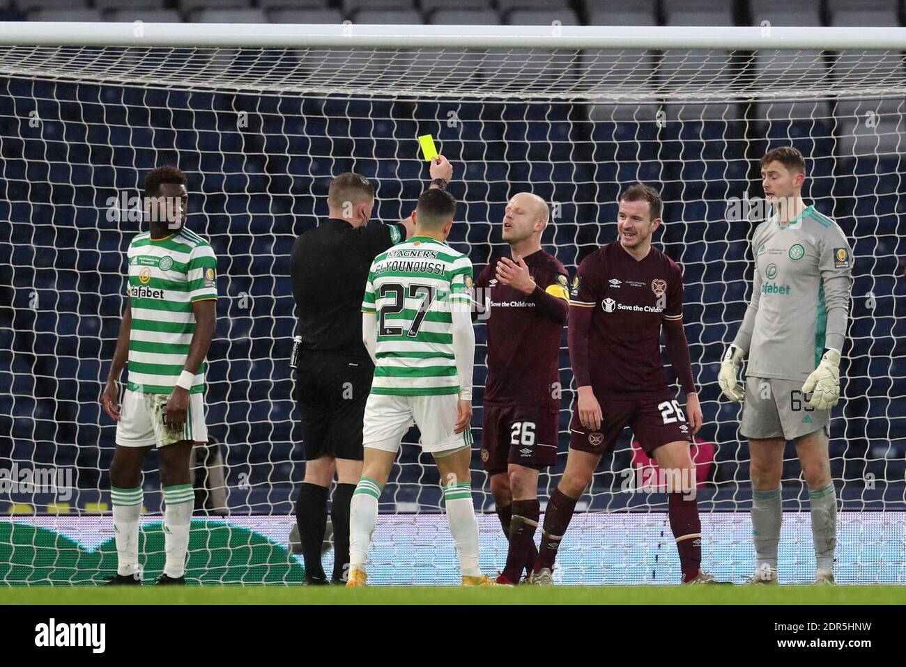 Hearts' Steven Naismith is shown the yellow card after flicking out an arm in the face of Celtic's Scott Brown whilst jostling for position in the penalty area during the Scottish Cup Final at Hampden Park, Glasgow. Stock Photo