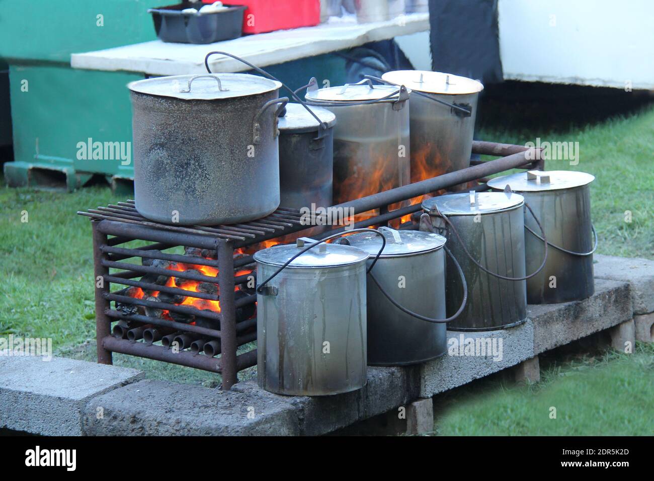 Cooking Pans on a Large Outdoor Coal Fire Stove Stock Photo Alamy