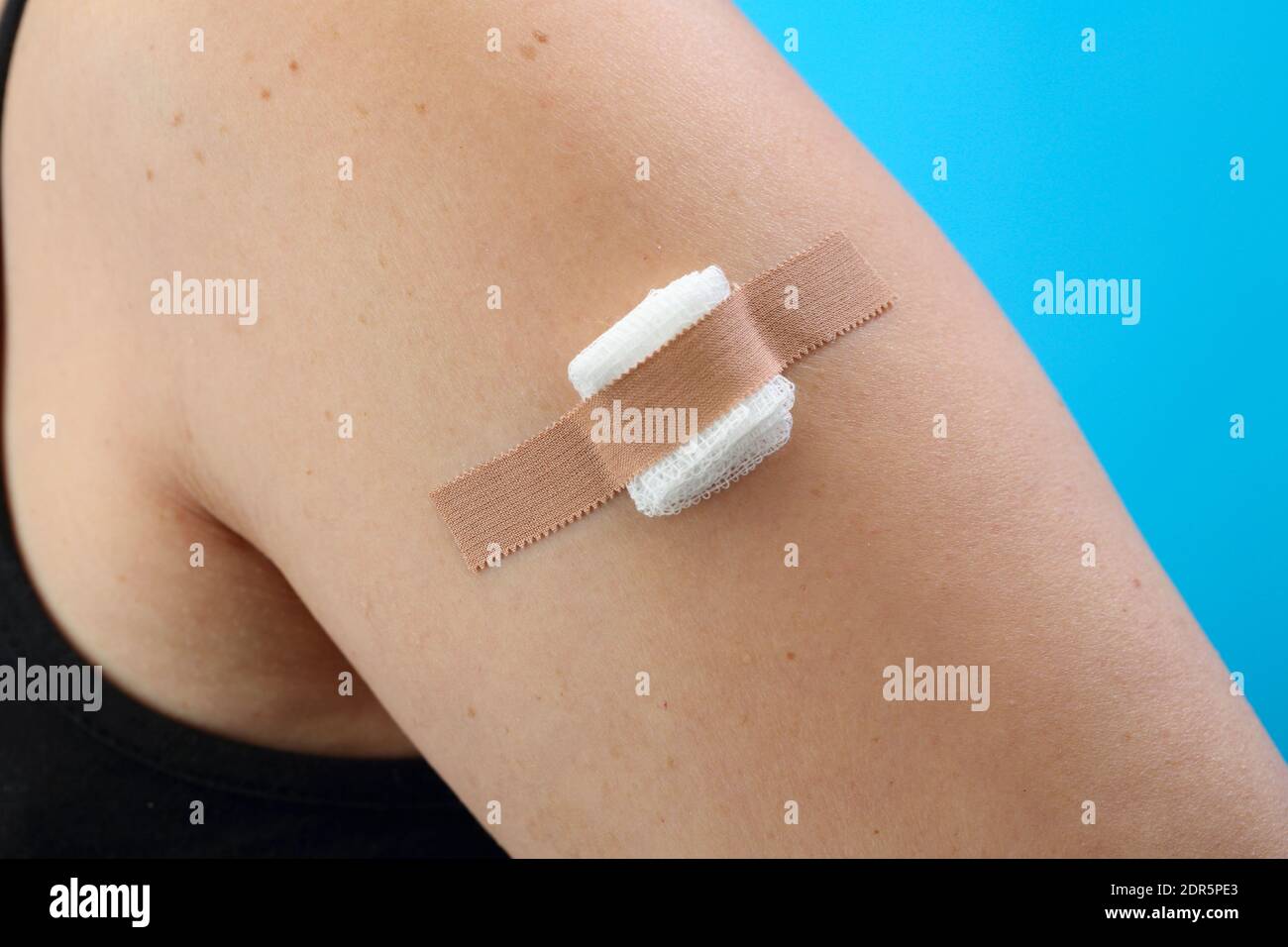 vaccination, patch on the shoulder, Stock Photo