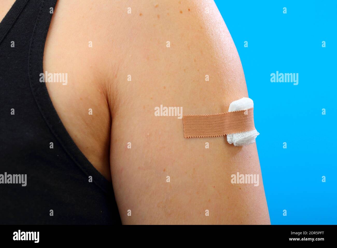 vaccination, patch on the shoulder, Stock Photo