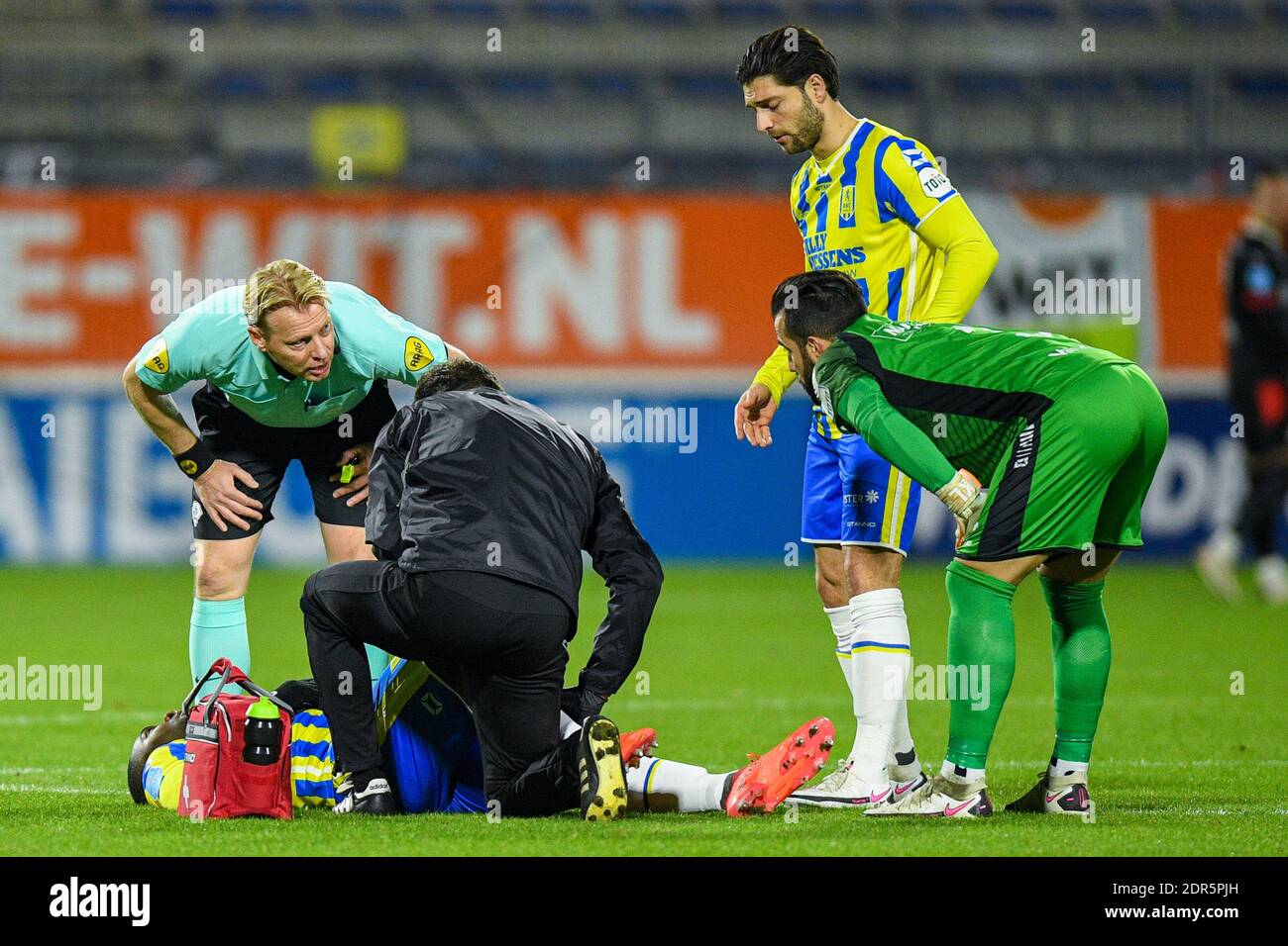 WAALWIJK, NETHERLANDS - DECEMBER 19: Ola John of RKC Waalwijk injured during the Dutch Eredivisie match between RKC Waalwijk and PSV at Mandemakers St Stock Photo