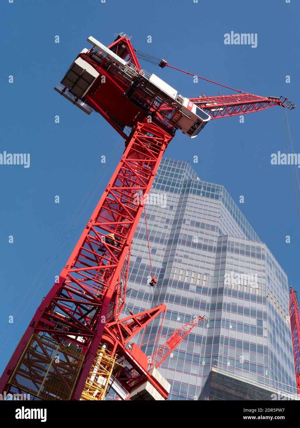 Cranes working on number 8 Bishopgate, with 22 Bishopsgate in background Stock Photo