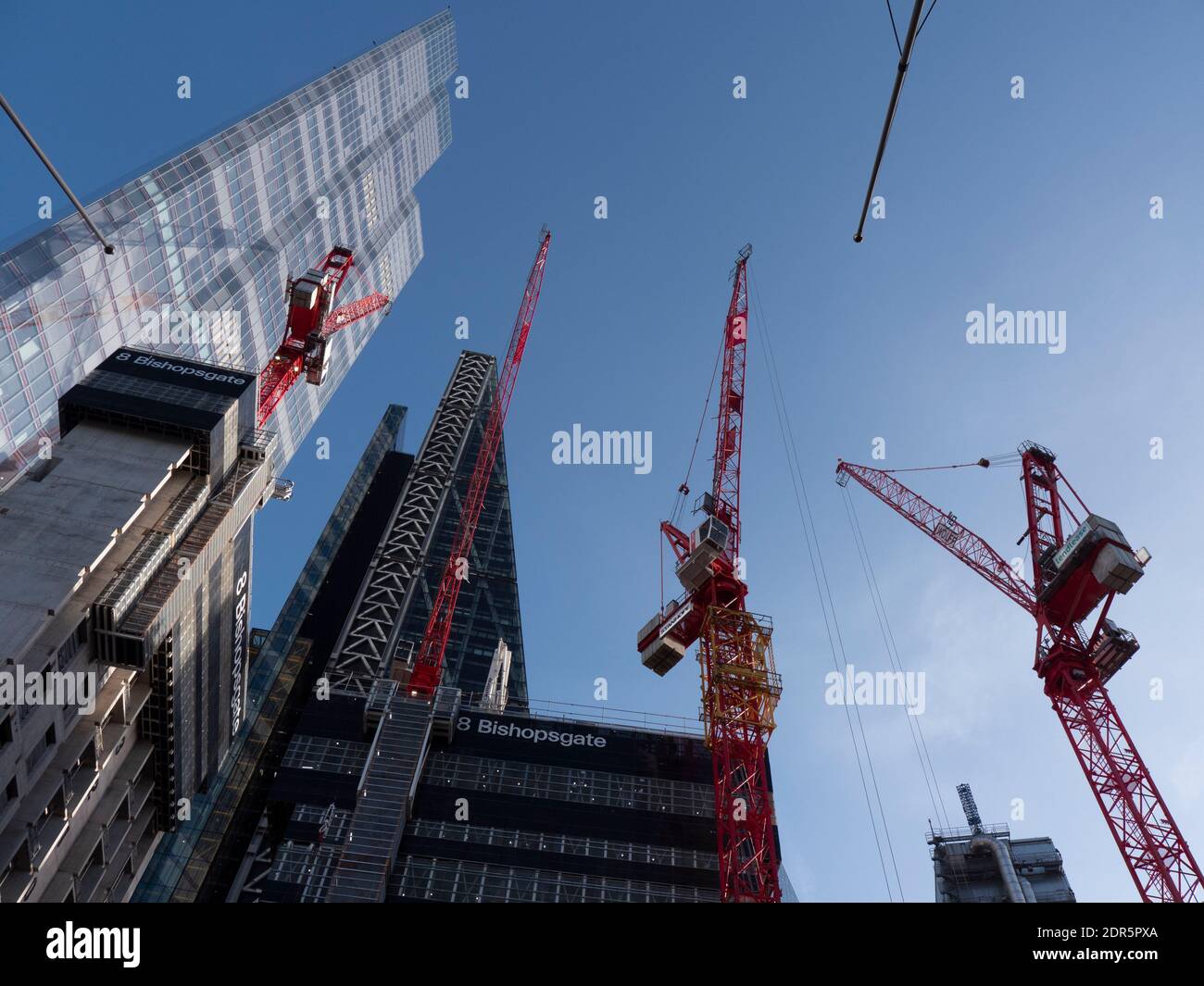 Cranes working on, WilkinsonEyre’s 8 Bishopsgate tower, with 22  Bishopsgate in background far left Stock Photo