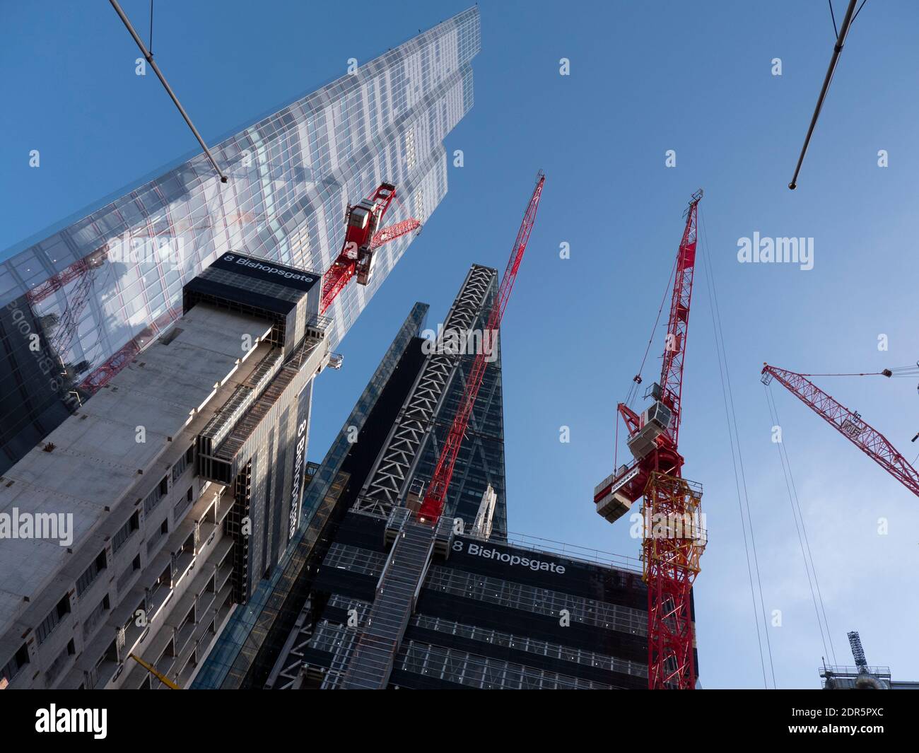 Cranes working on, WilkinsonEyre’s 8 Bishopsgate tower, with 22  Bishopsgate in background far left Stock Photo