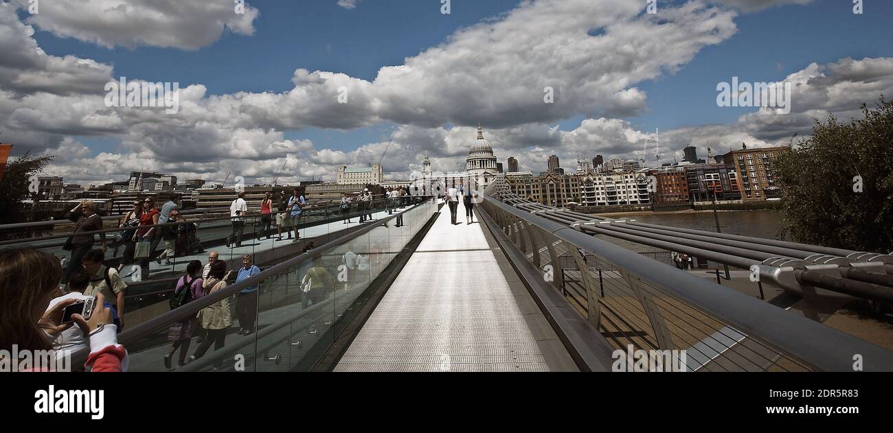 GREAT BRITAIN / London /Peopel crossing the Millennium Bridge towards St. Paul's Cathedral. Stock Photo
