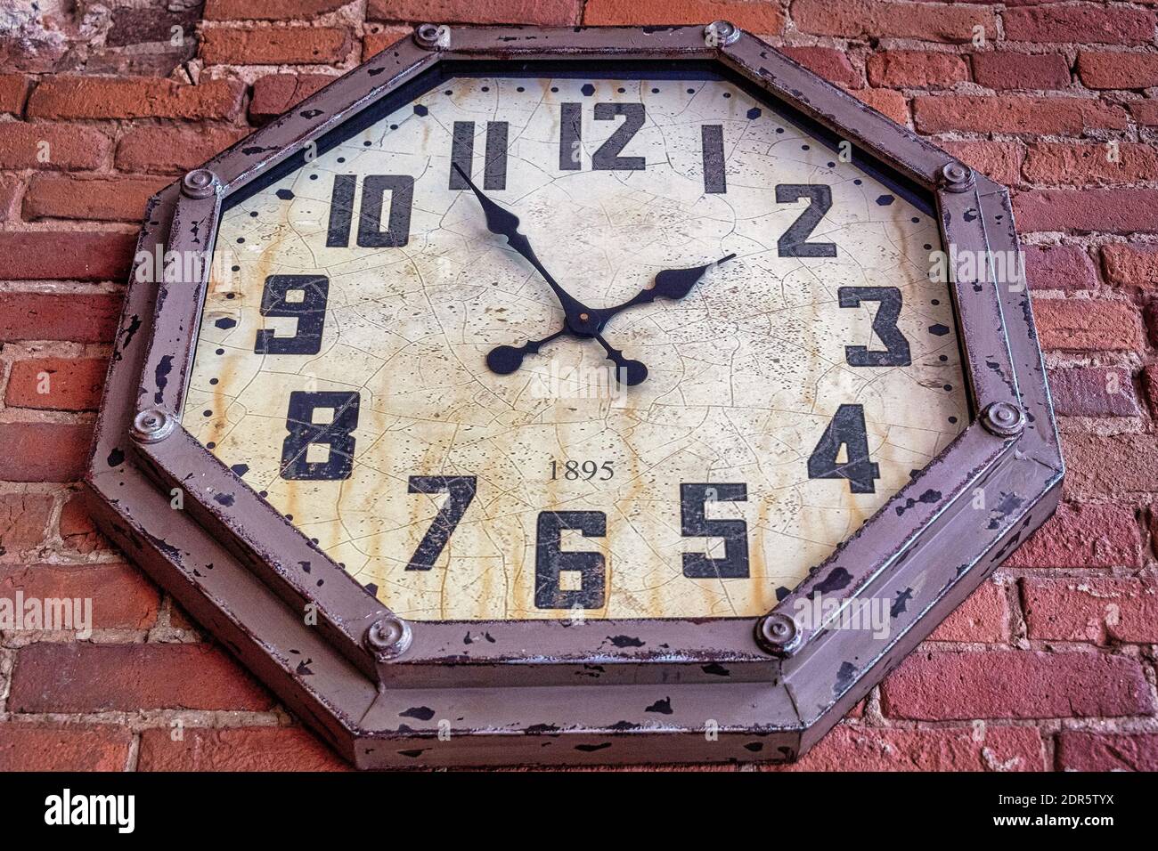 Old vintage wall clock, low angle view Stock Photo