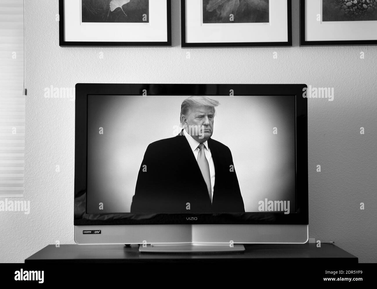 U.S. President Donald Trump appears on a television set tuned into a PBS broadcast. Stock Photo