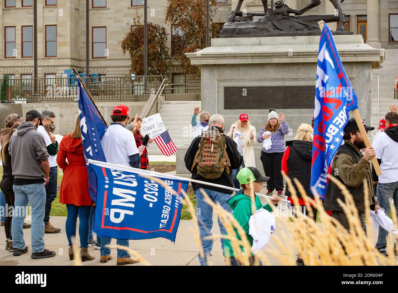 Helena, Montana / Nov 7, 2020: Protestors at Stop the Steal rally at the capitol pray and protest Joe Biden as president-elect, perceive election and Stock Photo