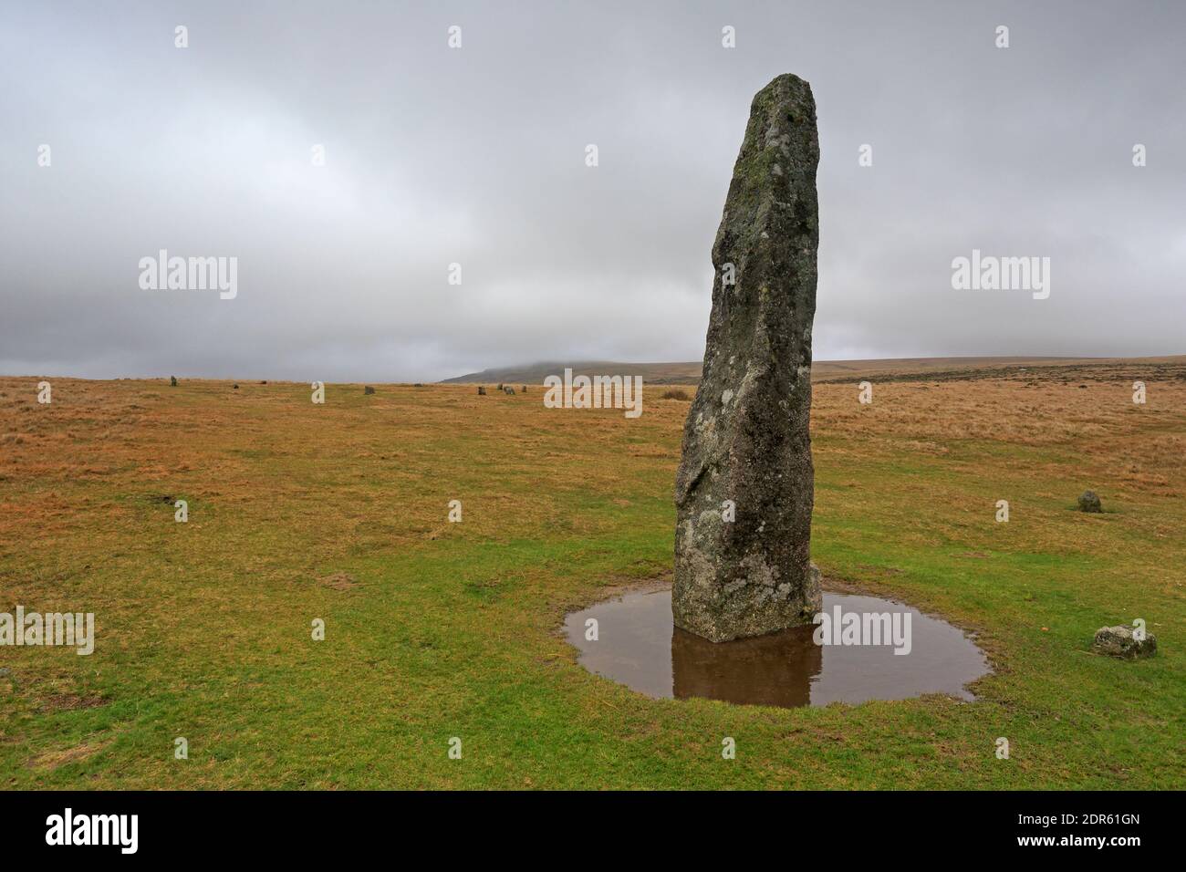 Standing Stone with a stone circle in the background at Merrivale ...