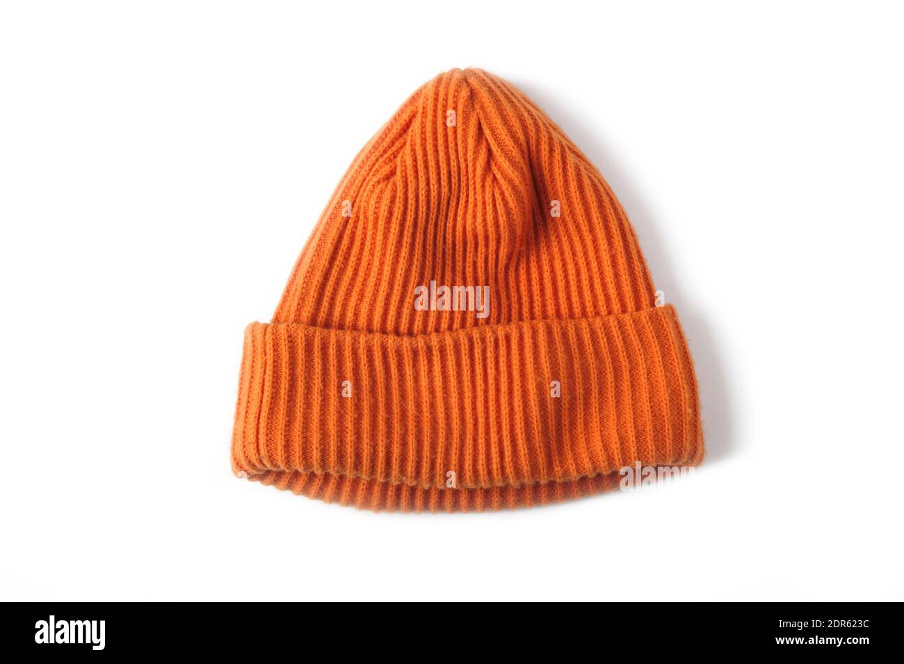 Orange wool knitted hat isolated on white background Stock Photo