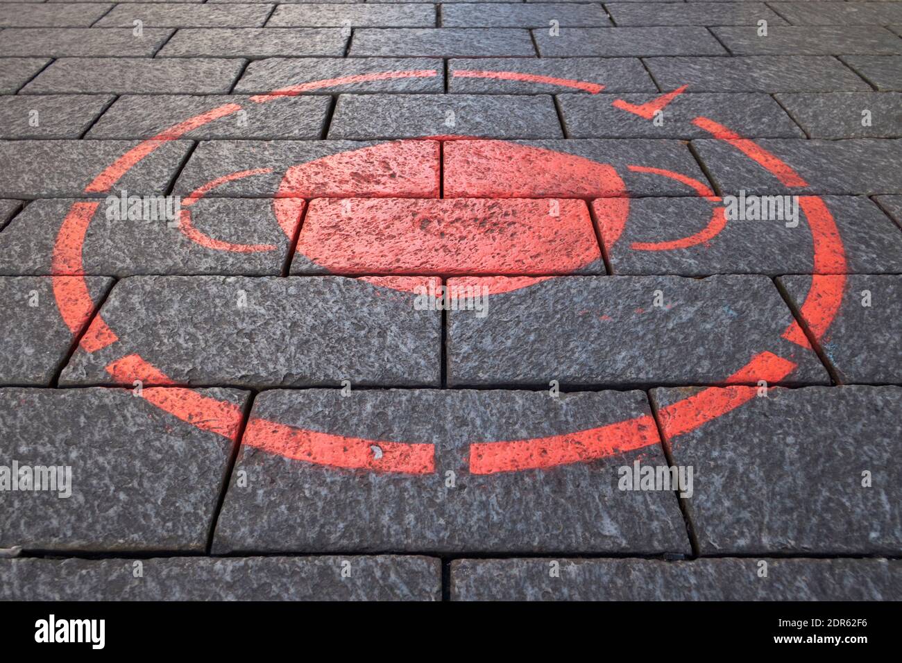 Notice on the floor reminding of the compulsory wearing of masks in the pedestrian zone in Cologne Stock Photo