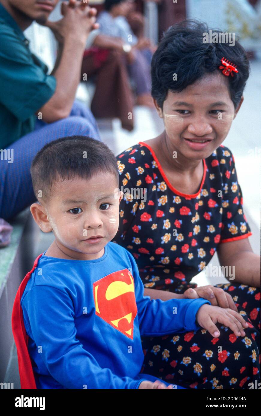 Young boy in Superman costume, Yangon, Myanmar. July 1999 Stock Photo