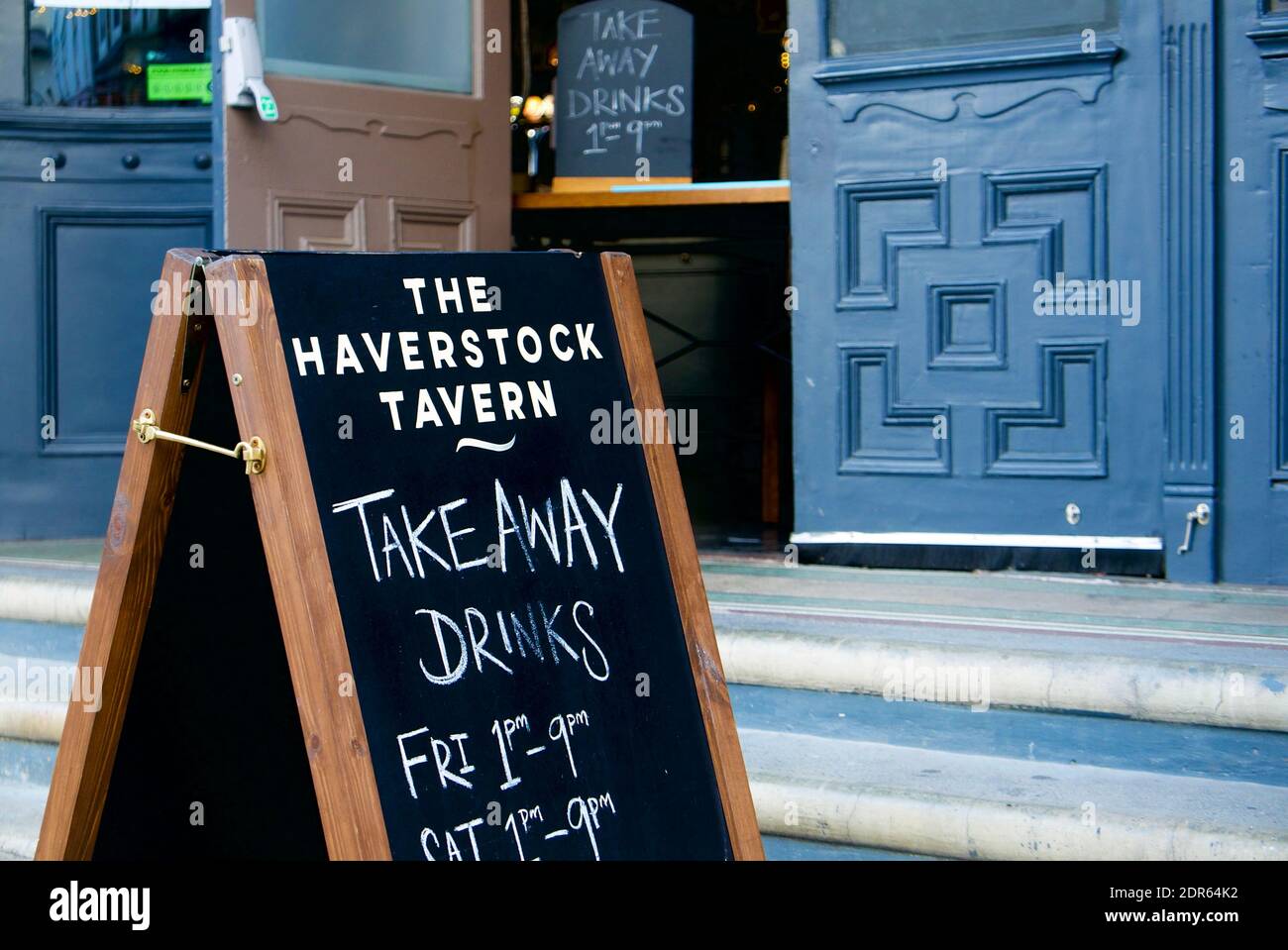 Sign advertising take away alcoholic drinks at The Haverstock Tavern a pub closed to customers due to tier 4 covid19 restrictions. Hampstead, London. Stock Photo
