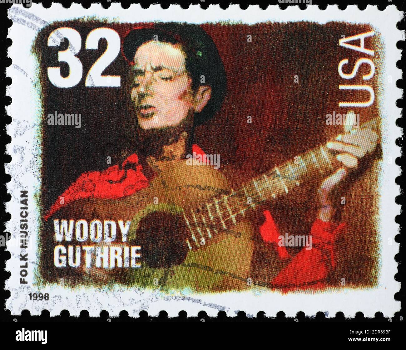 Woody Guthrie on american postage stamp Stock Photo