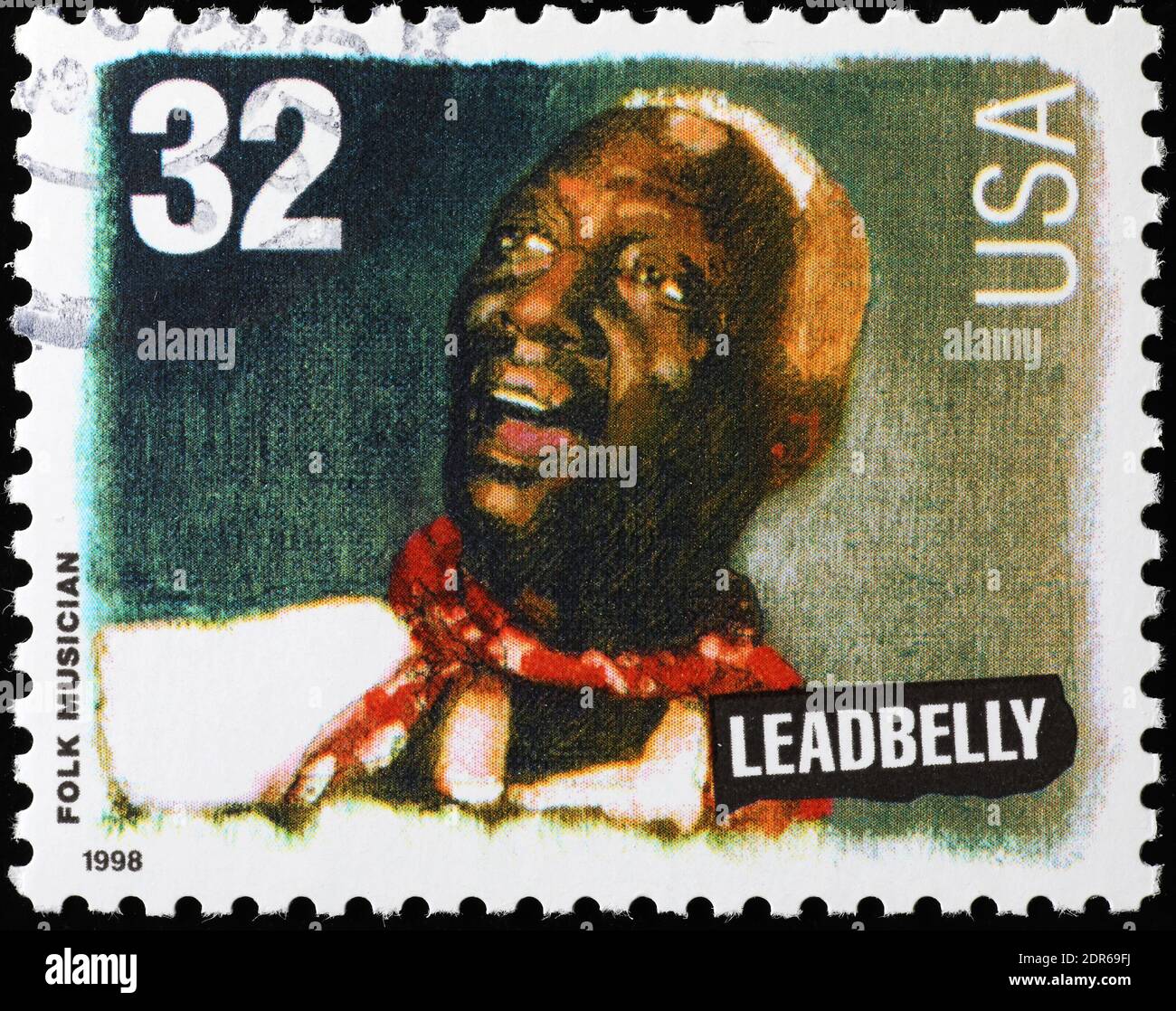 Bluesman Leadbelly on american postage stamp Stock Photo