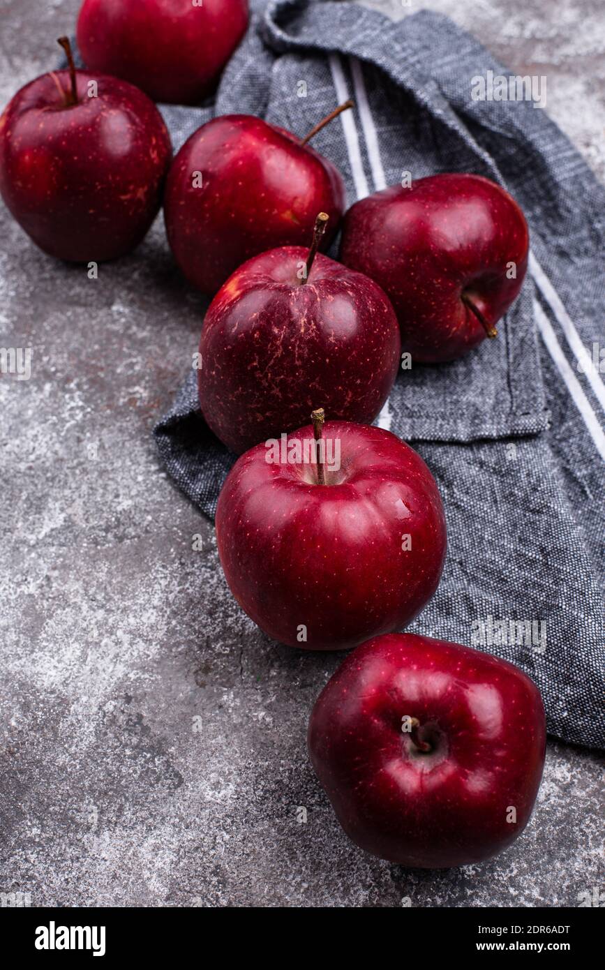 Fresh red ripe apples on gray background Stock Photo - Alamy
