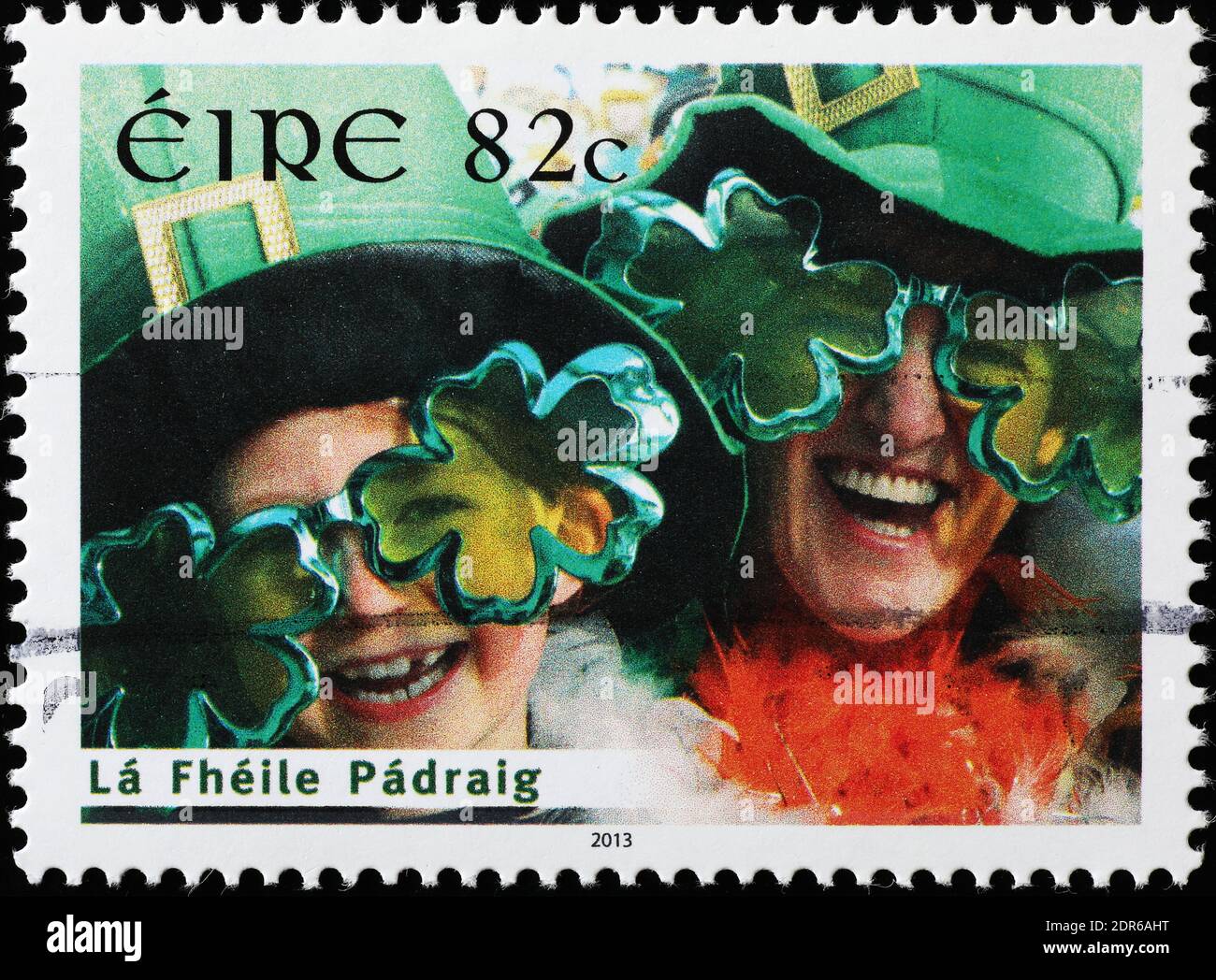 Irish people celebrating St.Patrick on postage stamp Stock Photo