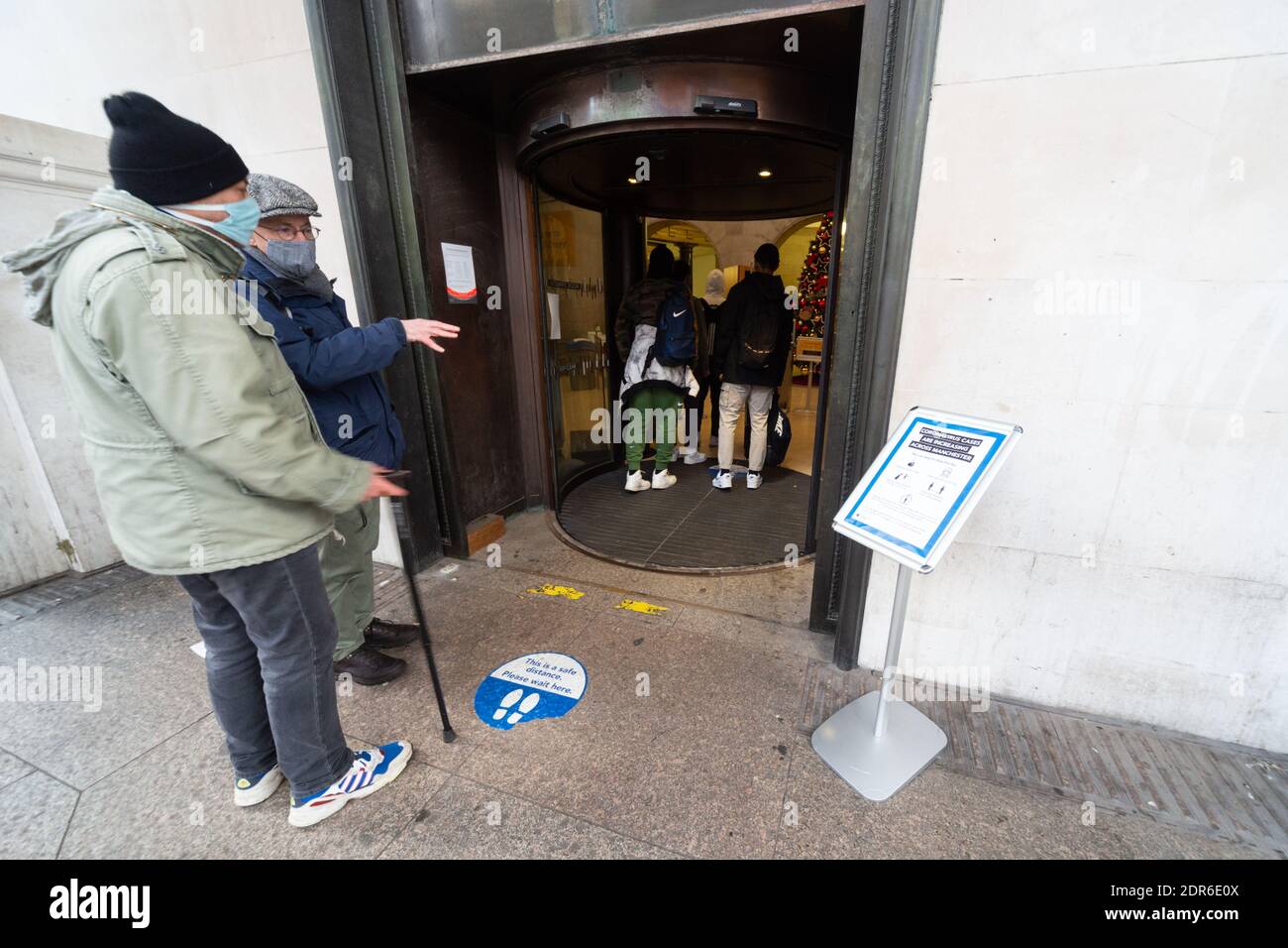 Social distancing at the entrance to Manchester Central Library ...