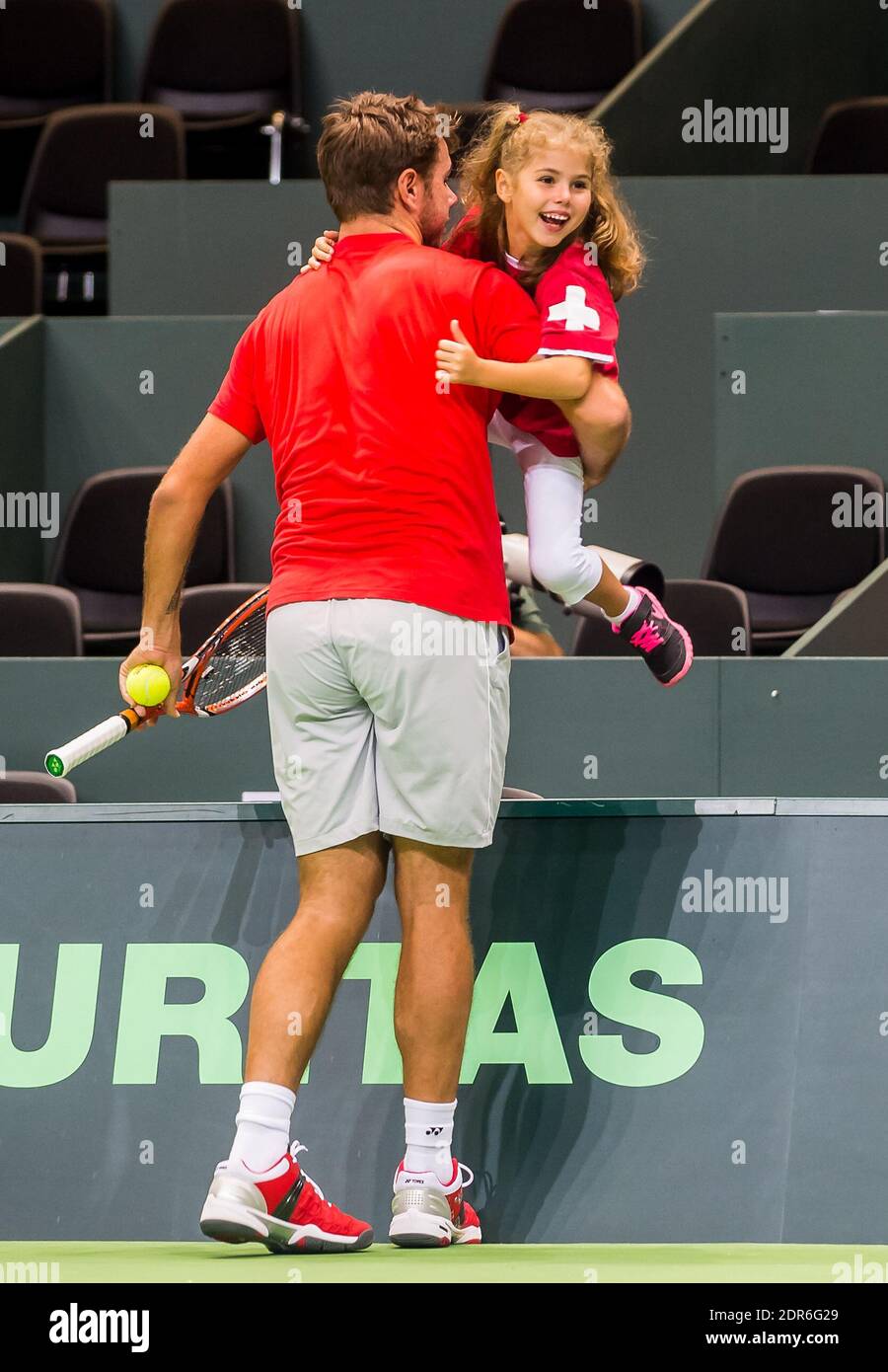 Stanislas 'Stan' Wawrinka during his training session with his daughter  Alexia Wawrinka before the Davis Cup World Group playoff tennis tie match  between Switzerland and the Netherlands in Geneva, Switzerland on September