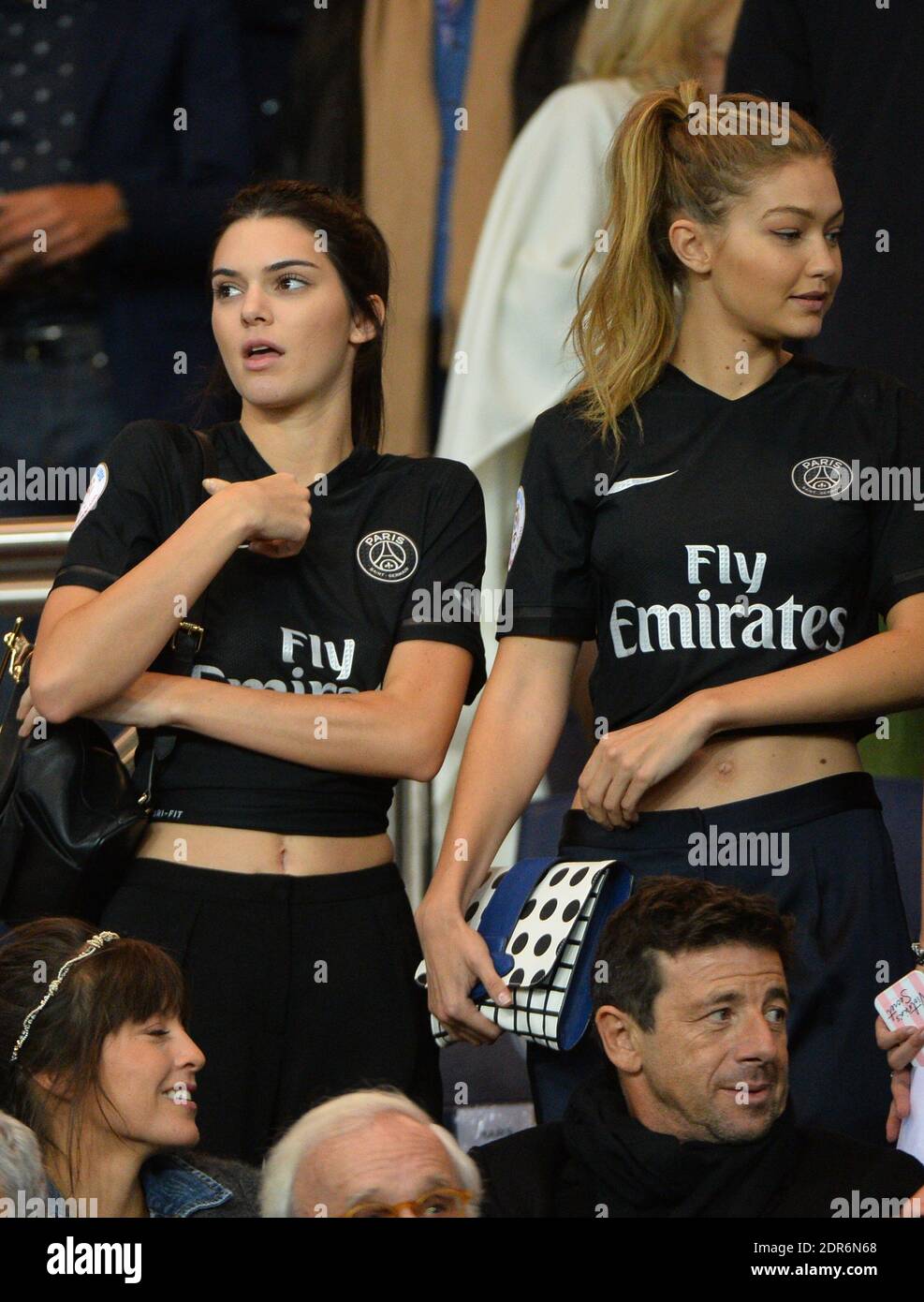 Kendall Jenner and Gigi Hadid watch from the stands French Ligue 1 match Paris  Saint-Germain FC (PSG) v Olympique de Marseille at Parc des Princes stadium  in Paris, France, on October 4,