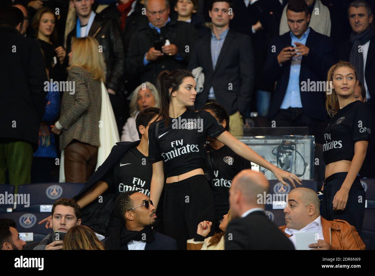Kendall Jenner and Gigi Hadid watch from the stands French Ligue 1 match Paris  Saint-Germain FC (PSG) v Olympique de Marseille at Parc des Princes stadium  in Paris, France, on October 4,