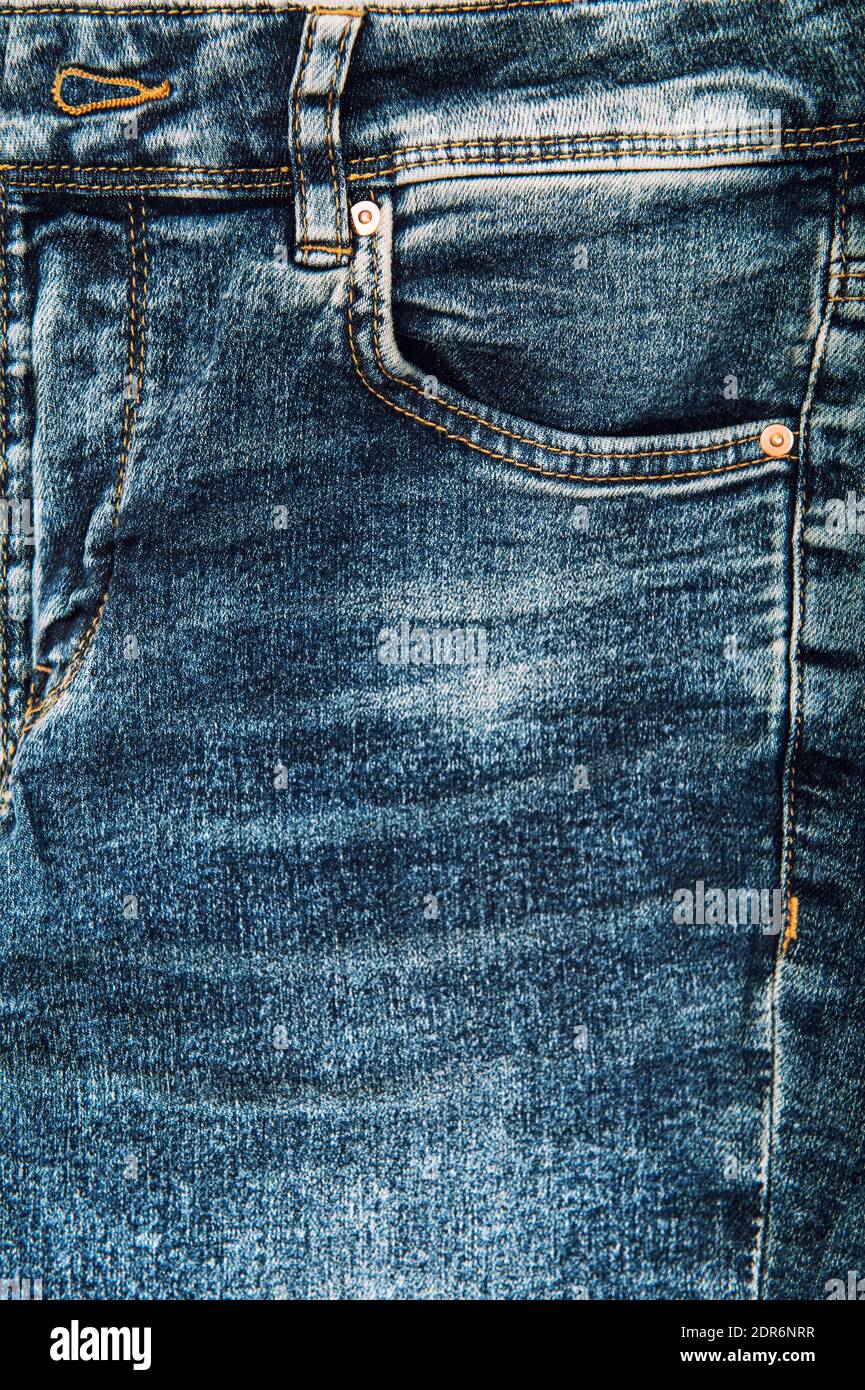 Jeans denim fabric texture with seam. Blue jeans background Stock Photo