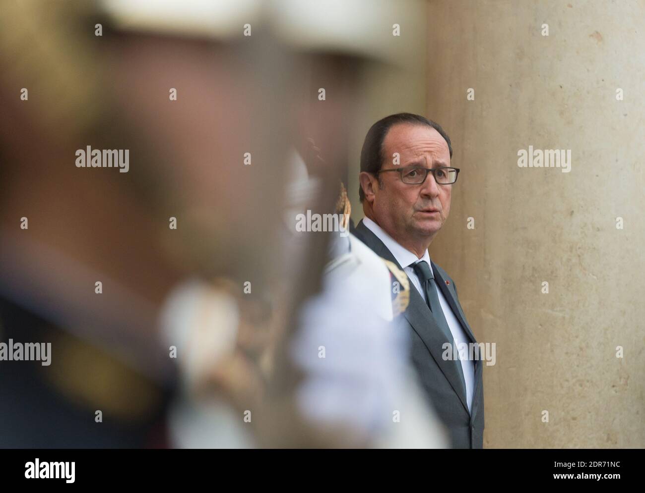 French President Francois Hollande waits to African Union