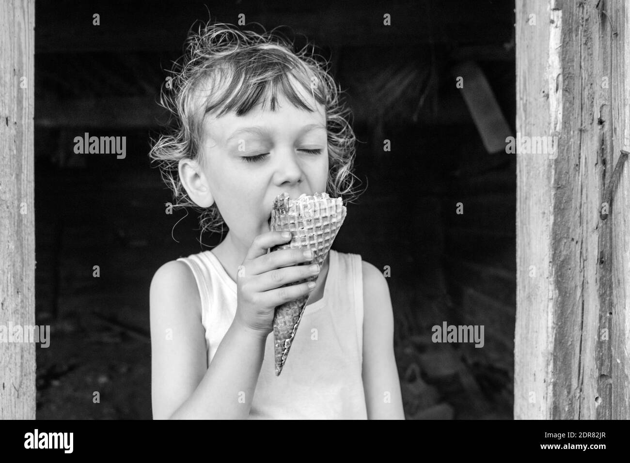 Black boy eating Black and White Stock Photos & Images - Alamy