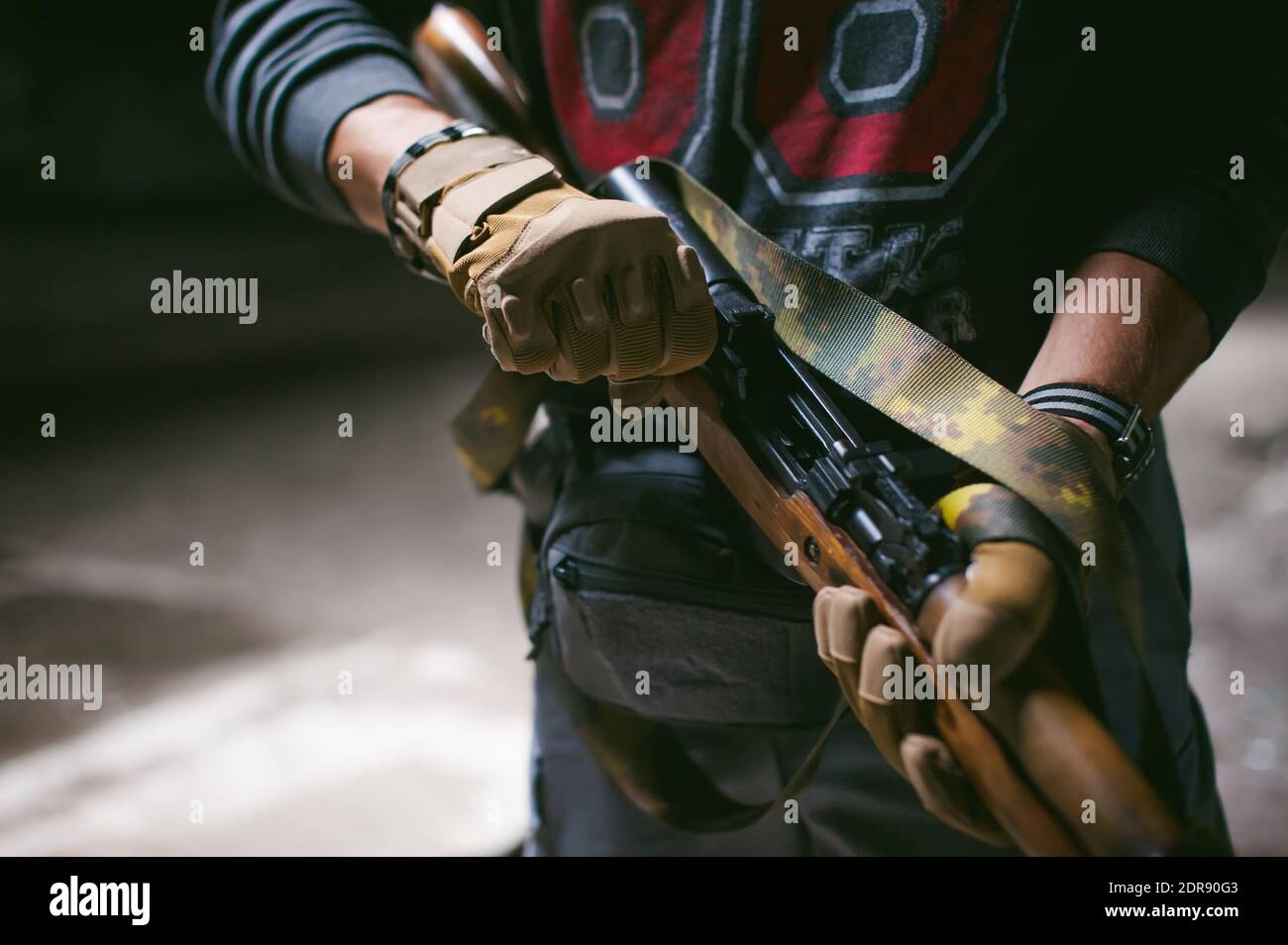 Holding assault rifle up hi-res stock photography and images - Alamy