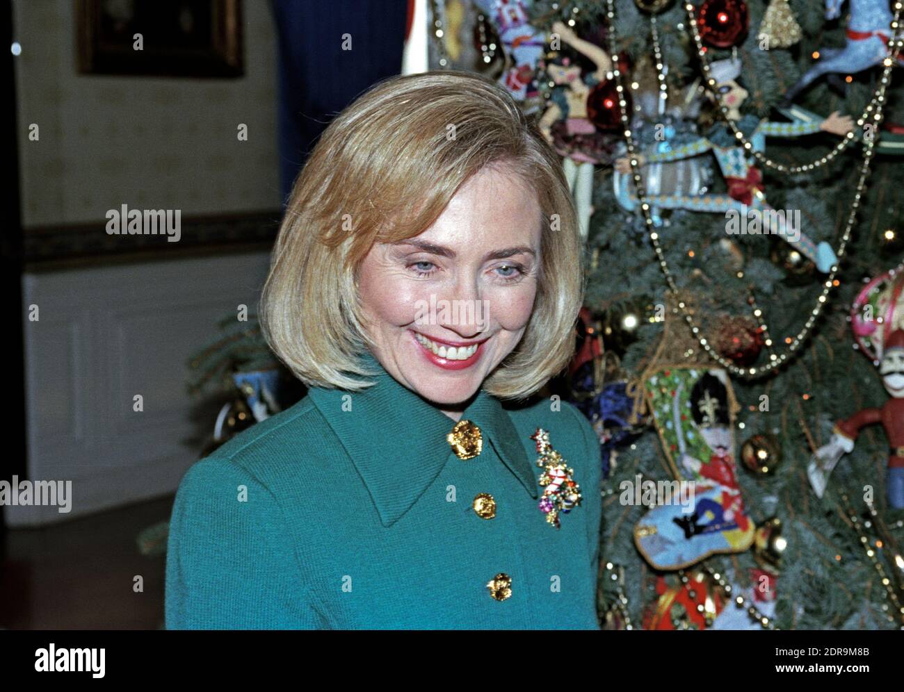 First lady Hillary Rodham Clinton guides members of the press through