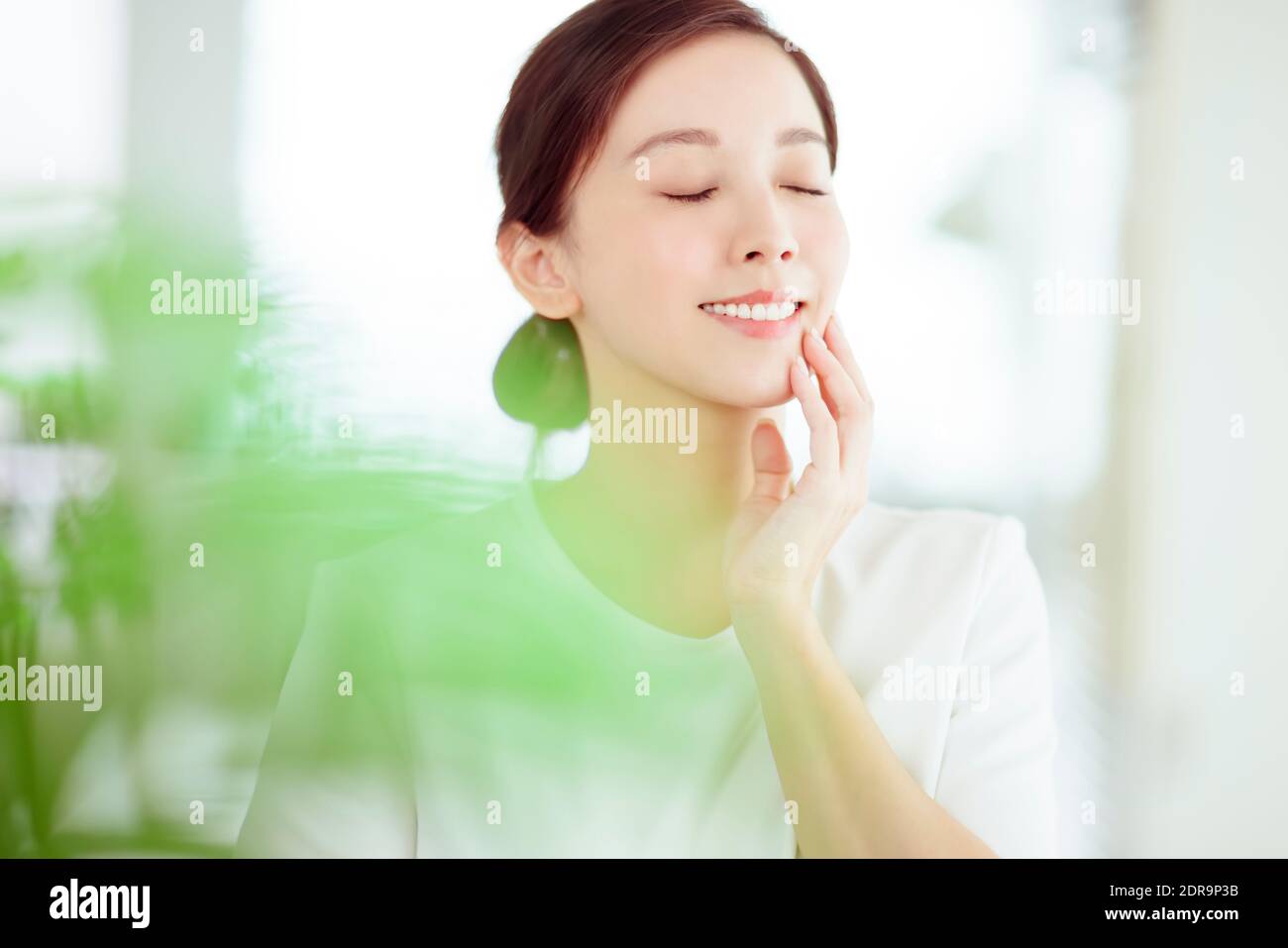 closeup beautuful young asian woman face with clean fresh healthy skin Stock Photo
