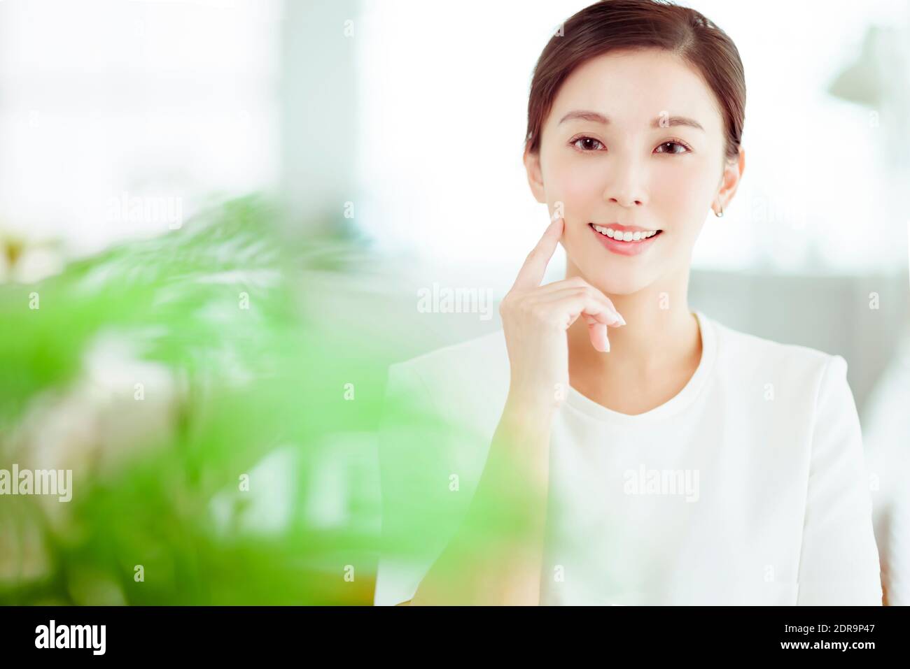 closeup beautuful young asian woman face with clean fresh healthy skin Stock Photo