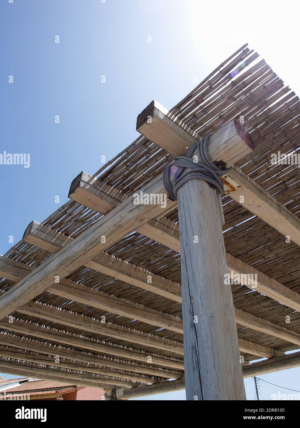Covered shade area The Boathouse, Roda, Corfu, Greece Stock Photo - Alamy