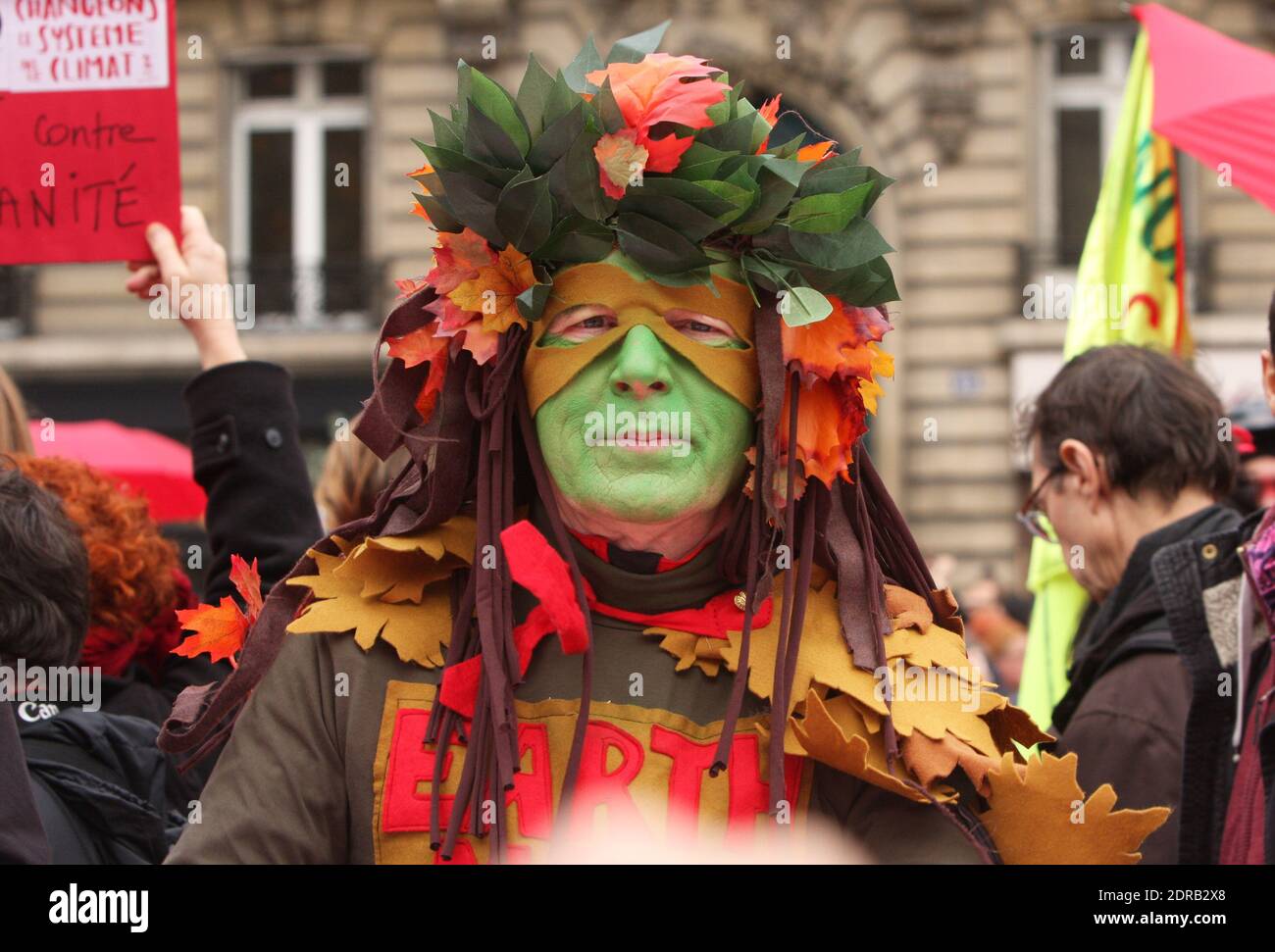 Activists stage a demonstration near the Arc de Triomphe at the Avenue de la Grande Armee boulevard in Paris, France, on December 12, 2015. A proposed 195-nation accord to curb emissions of the heat-trapping gases that threaten to wreak havoc on Earth's climate system is to be presented at the United Nations conference on climate change COP21 in Le Bourget, on the outskirts of Paris. Photo by Somer/ABACAPRESS.COM Stock Photo