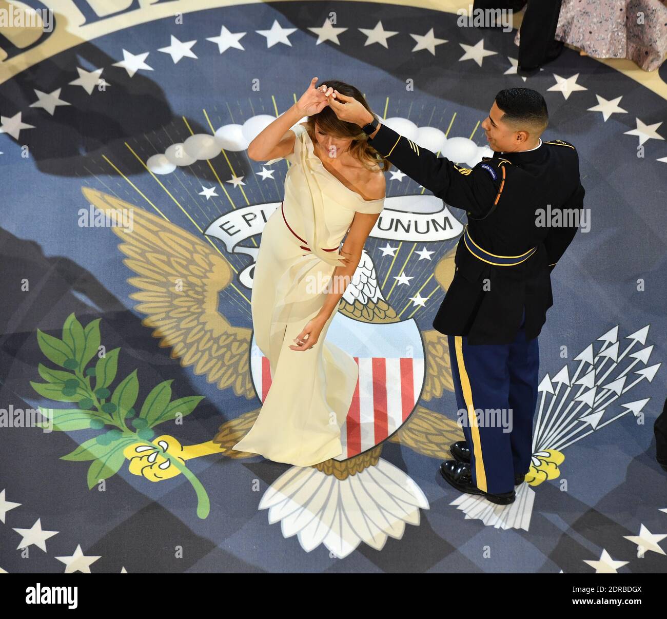 First Lady Melania Trump dances with a Marine at the A Salute to Our Armed  Services Ball on January 20, 2017 in Washington, D.C. Trump will attend a  series of balls to