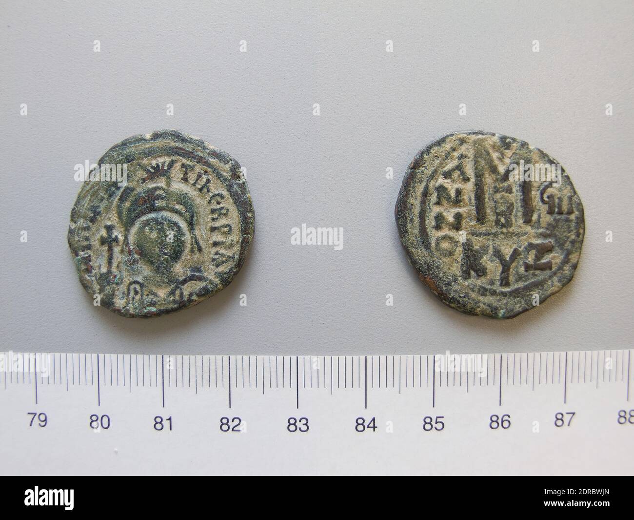 Mint: Cyzicus, Follis (40 Nummi) from Cyzicus, 589–90, Copper, 10.75 g, 6:00, 28 mm, Made in Cyzicus, Mysia, Byzantine, 6th century A.D., Numismatics Stock Photo