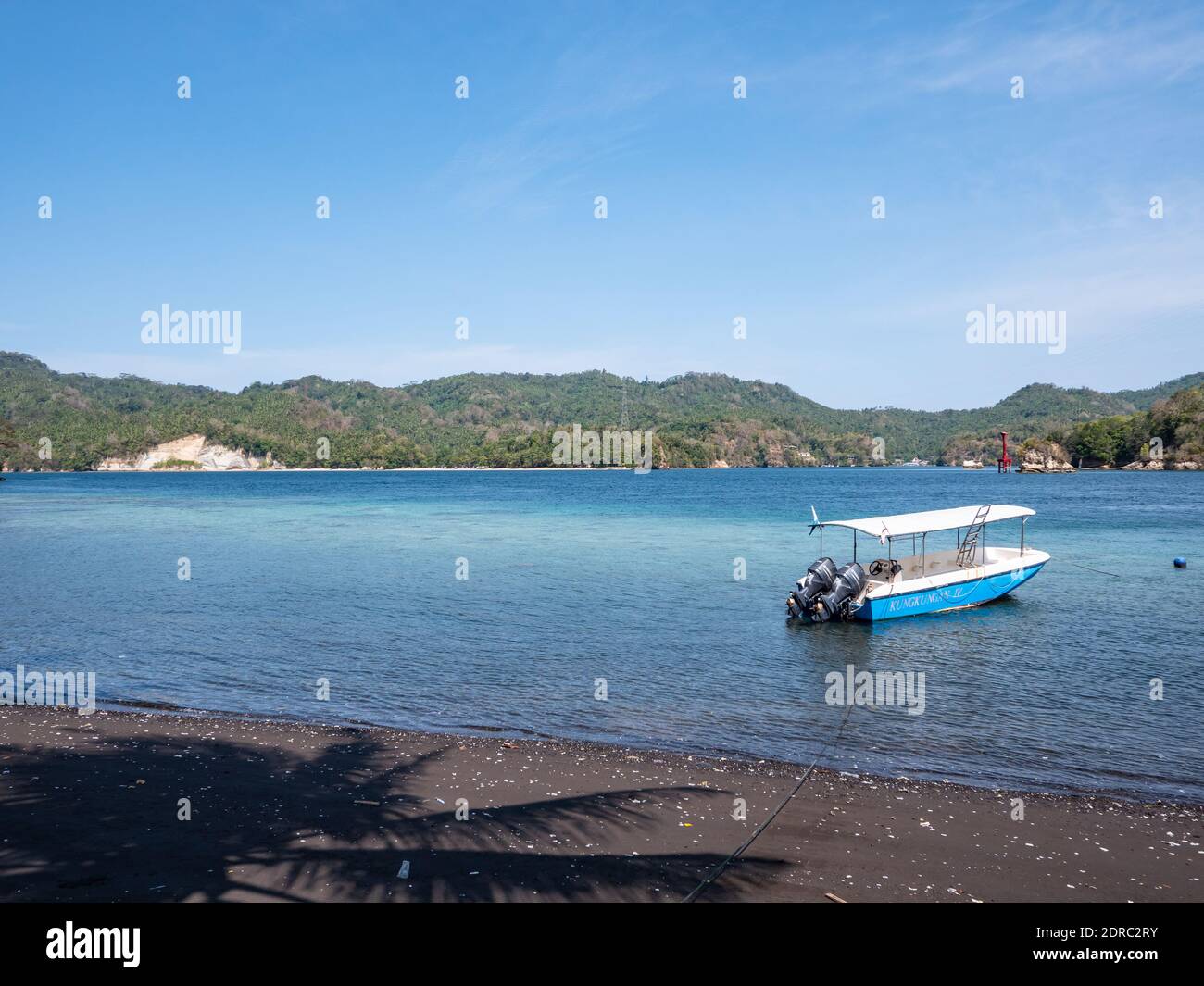 The Lembeh Strait between Bitung on North Sulawesi and Lembeh Island in Indonesia. The Lembeh Strait is known for its colourful marine life and the ar Stock Photo