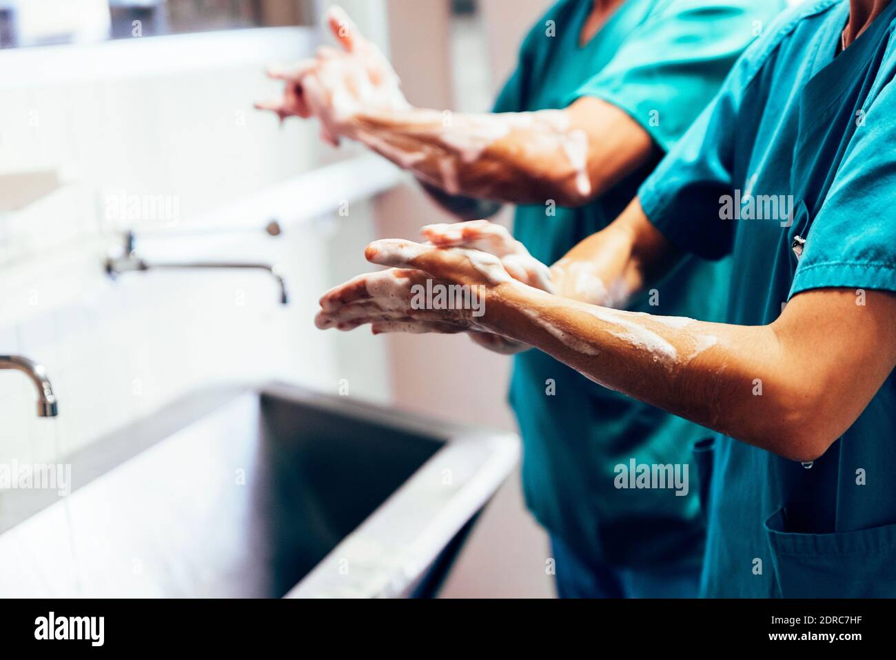 nurses-washing-hands-at-sink-stock-photo-alamy