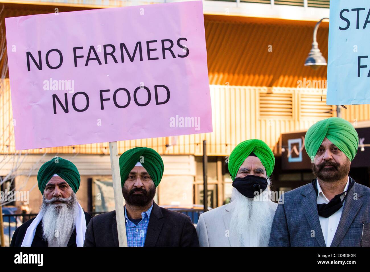 Reno, United States. 20th Dec, 2020. A protester wearing a face mask holds a placard that says No farmers, No food during the demonstration.Indian community gathered in Nevada to voice their solidarity with farmers in India as part of #standwithindianfarmers efforts. Credit: SOPA Images Limited/Alamy Live News Stock Photo