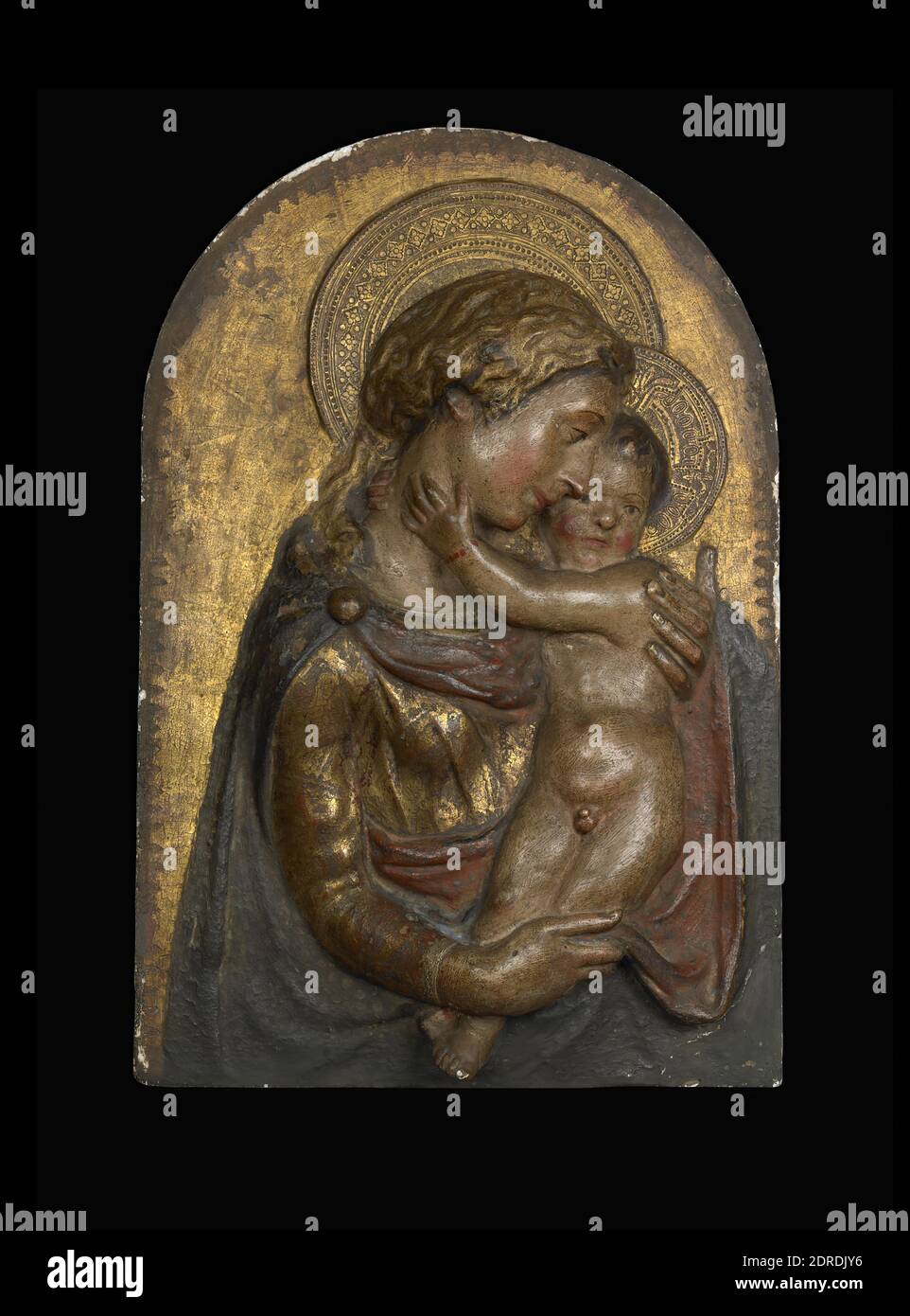 Artist: Donatello (Donato di Niccolò di Betto Bardi), Italian, Florence, 1386/87–1466, Artist: Matteo di Giovanni, Italian, Siena, ca. 1430 –1495/99, Virgin and Child, Polychrome and gilt stucco, unframed: 59.69 × 38.1 cm (23 1/2 × 15 in.), Made in Italy, Italian, 15th century, Sculpture Stock Photo