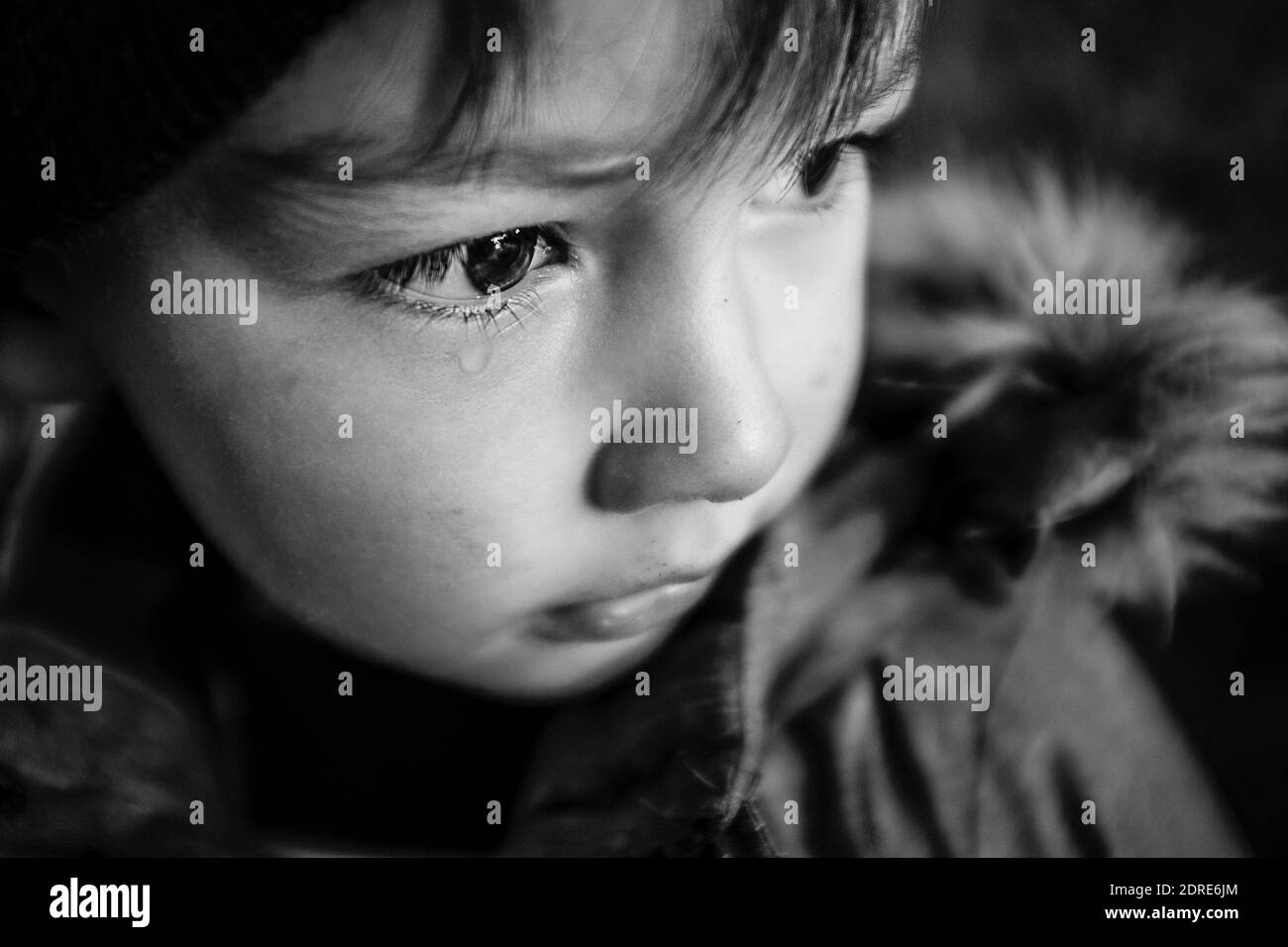 Close up boys crying face Black and White Stock Photos & Images - Alamy