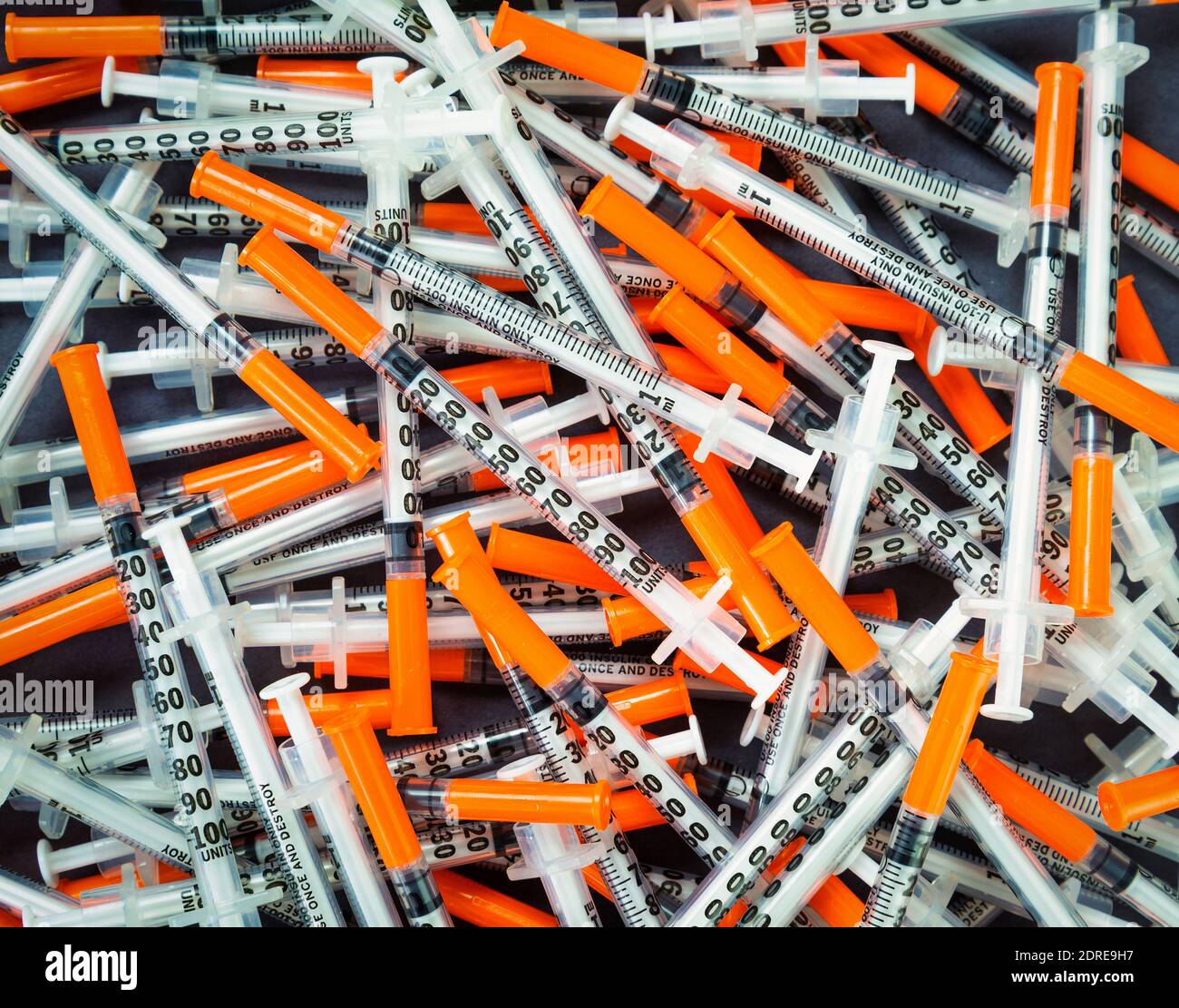 Orange Insuline Syringes for diabetic control Stock Photo Alamy