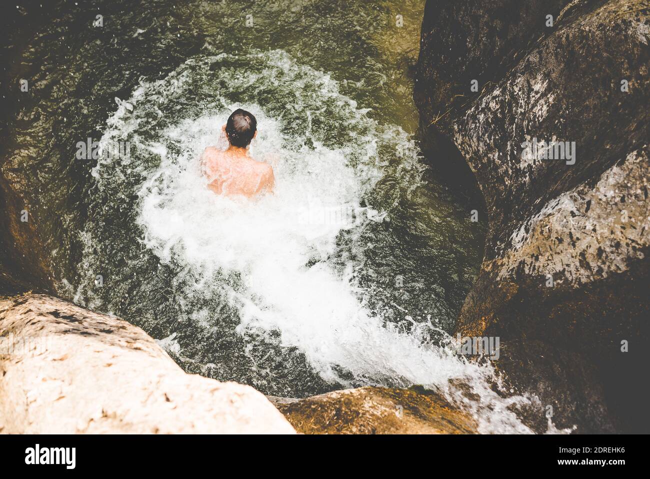 High Angle View Of Teenage Boy Swimming In River Stock Photo Alamy